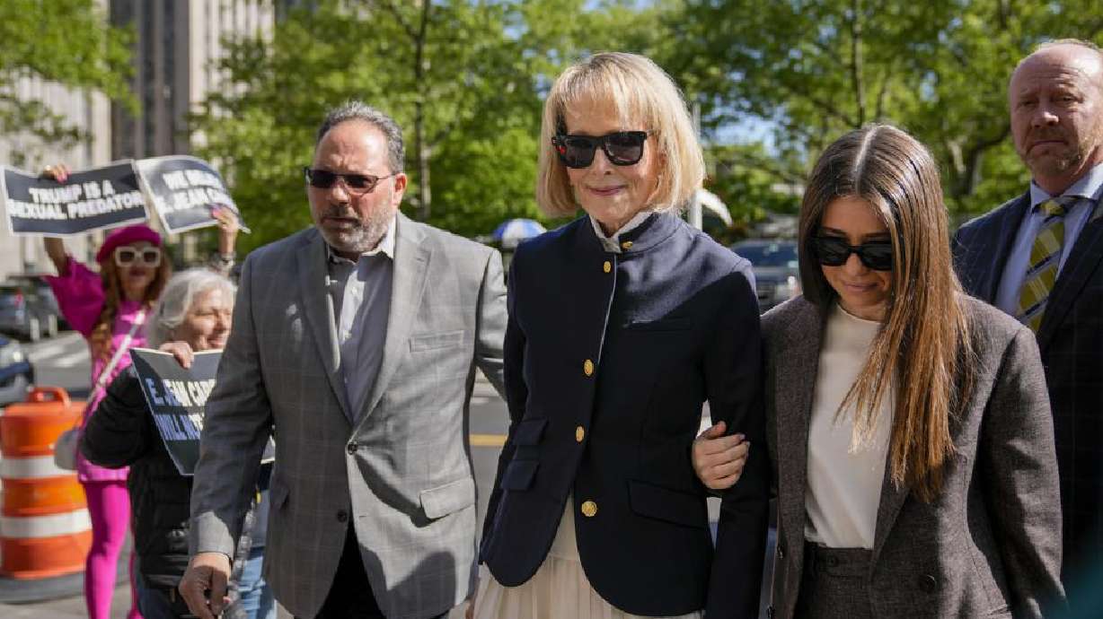 Former advice columnist E. Jean Carroll arrives to Manhattan federal court, Monday in New York. The lawyer for former President Donald Trump wants a mistrial in his client's rape case.