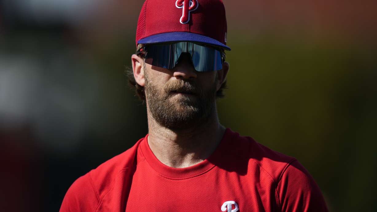 Philadelphia Phillies' Bryce Harper walks the field before a baseball game against the Colorado Rockies, Friday, April 21, 2023, in Philadelphia.