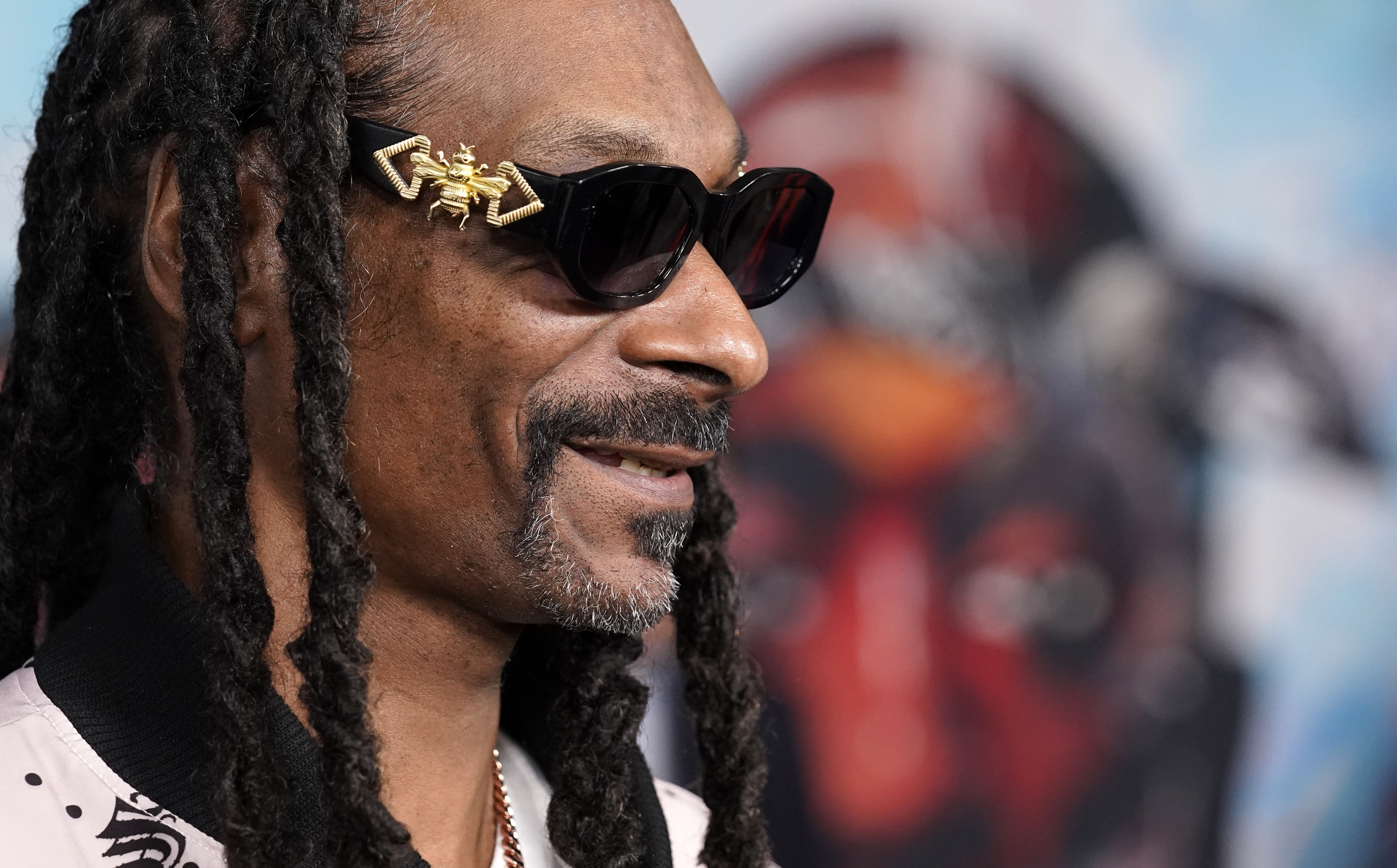 Rapper Snoop Dogg arrives at the premiere of the FX docuseries "Dear Mama," Tuesday, April 18, 2023, at The Ted Mann Theater in Los Angeles. The series explores the legacies of rapper Tupac Shakur and his mother Afeni. 