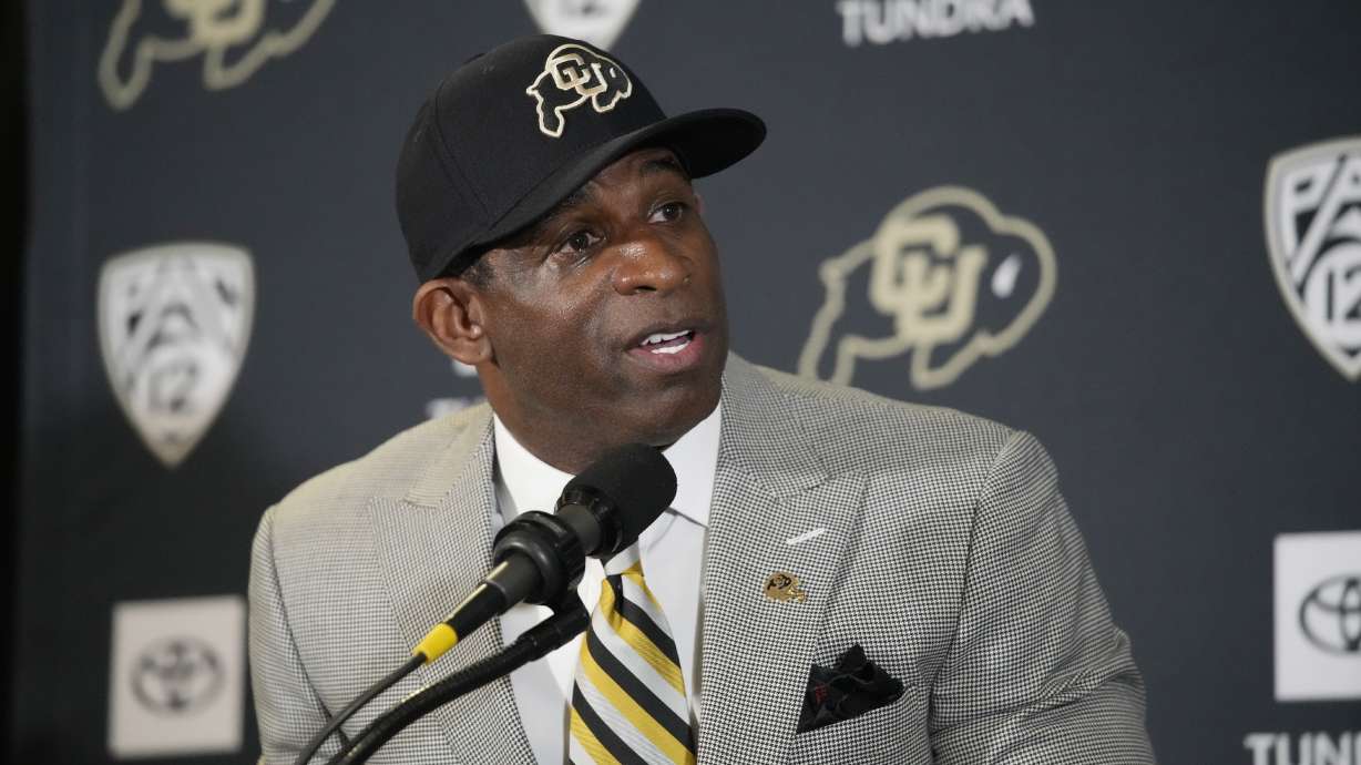 Deion Sanders speaks after being introduced as the new head football coach at the University of Colorado during a news conference Sunday, Dec. 4, 2022, in Boulder, Colo.