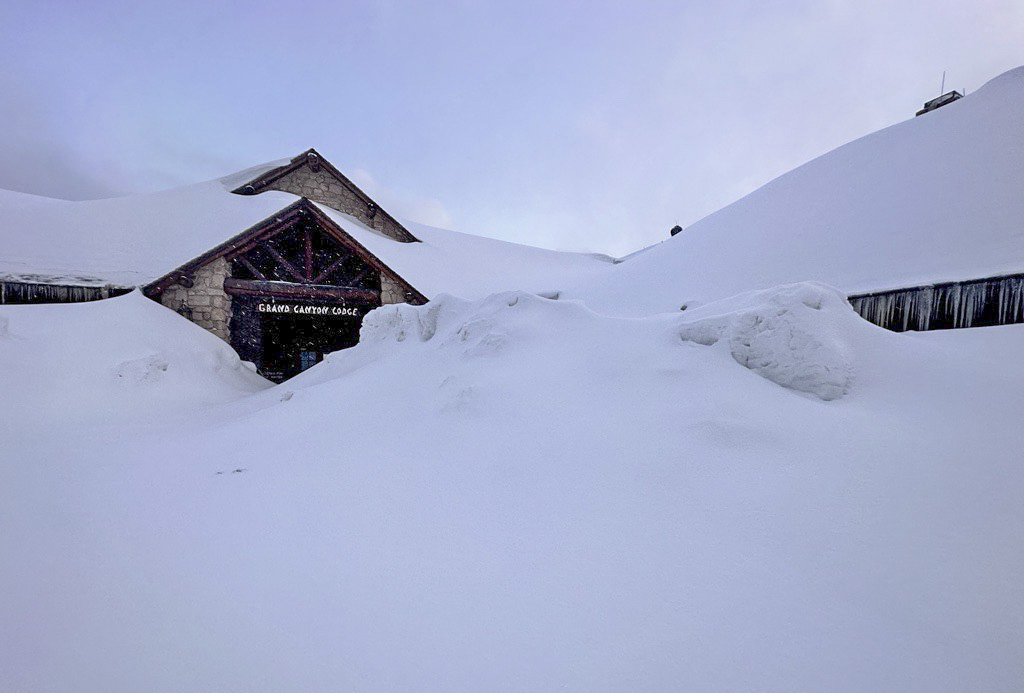 The Grand Canyon Lodge, located at the North Rim of the Grand Canyon, is barely visible following record-breaking snowfall this winter.