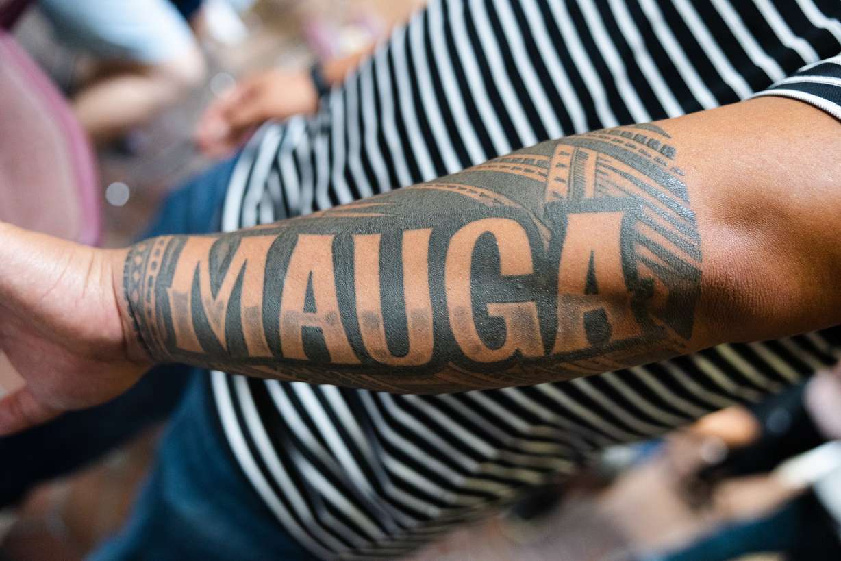 Loimata Mauga displays a traditional “tatau,” a Samoan tattoo, with his family name during the kickoff of Asian-Pacific Islander Heritage month at the Salt Lake County Government Center in Salt Lake City on Monday.