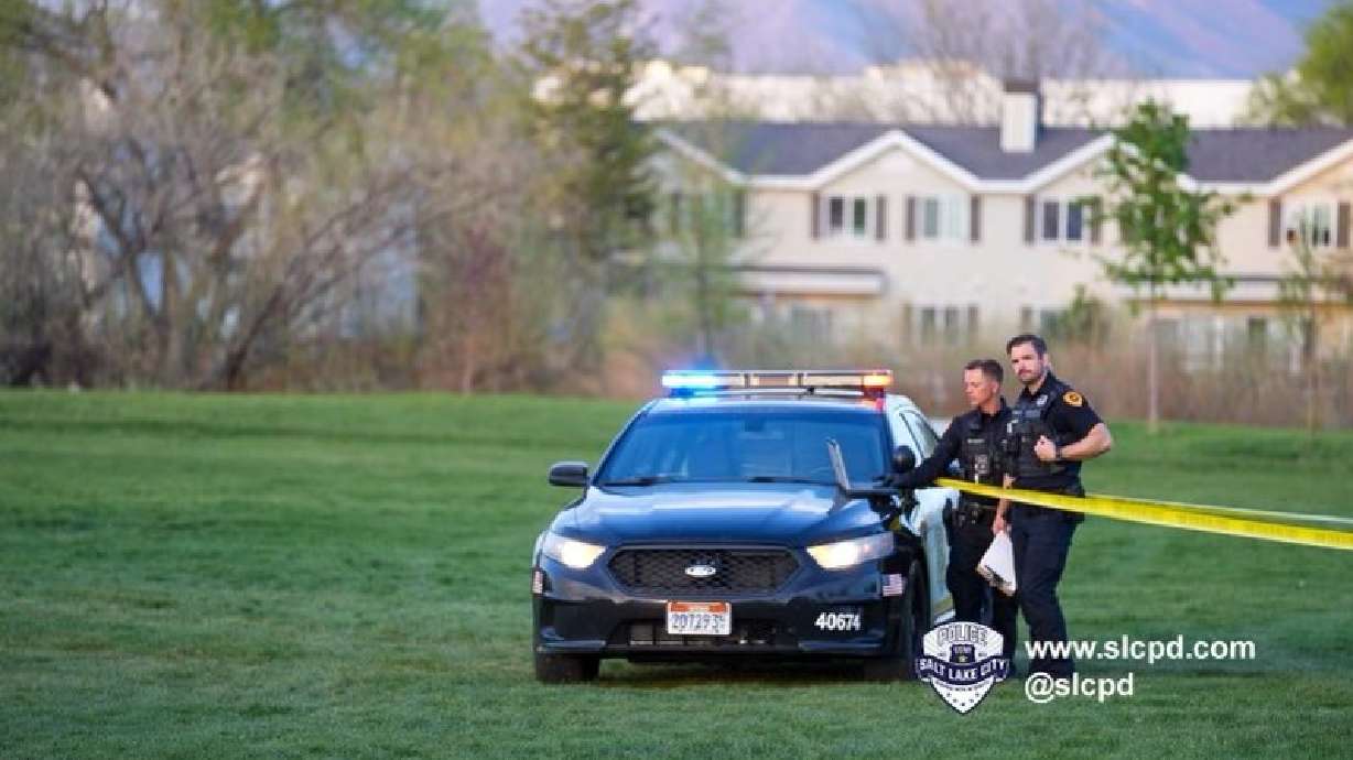 Salt Lake police officers investigate a shooting that occurred at 17th South River Park on May 1. A man who was arrested in the case was charged with 25 felonies on Thursday