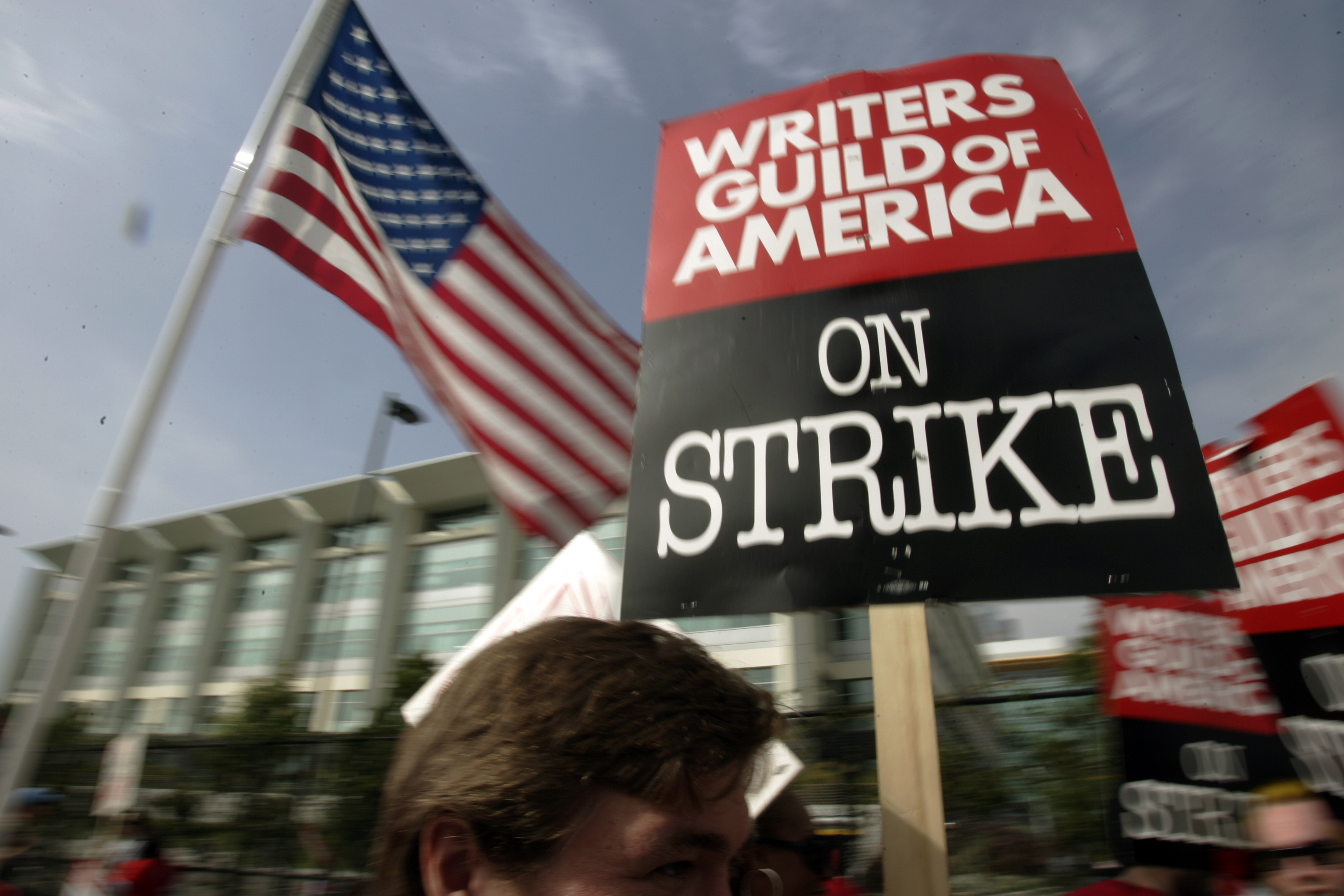 Writers Guild of America writers strike in a rally at Fox Plaza in Los Angeles' Century City district on Nov. 9, 2007. Television and movie writers on Monday declared that they will launch an industrywide strike for the first time since 2007.
