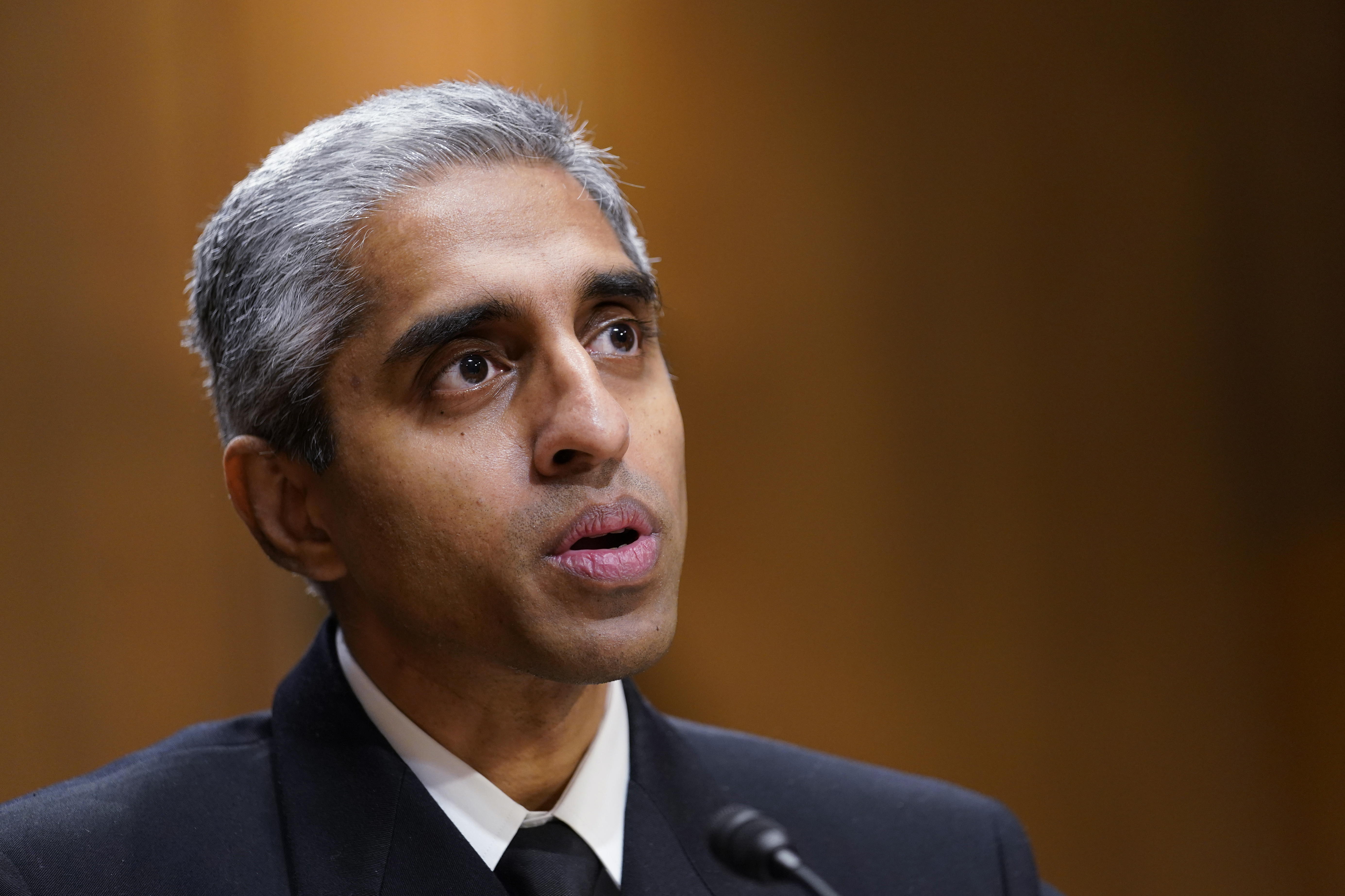 Surgeon General Dr. Vivek Murthy seen here on Capitol Hill in Washington, on Feb. 8, 2022, says widespread loneliness in the U.S. is posing health risks as deadly as smoking a dozen cigarettes daily, costing the health industry billions of dollars annually.