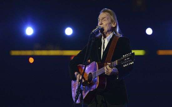 Gordon Lightfoot performs during the half-time show at the CFL Grey Cup championship football game between the Toronto Argonauts and the Calgary Stampeders on Nov. 25, 2012, in Toronto. Canada's legendary folk singer-songwriter, whose hits include “Early Morning Rain” and “The Wreck of the Edmund Fitzgerald," died on Monday at a Toronto hospital, a representative of his family said. He was 84.