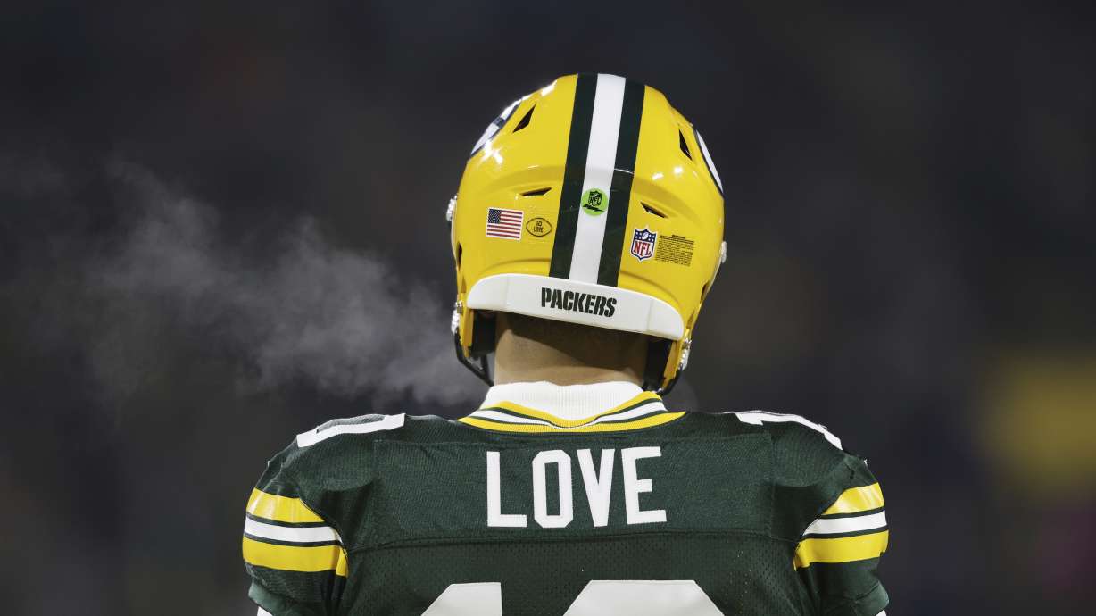 Green Bay Packers quarterback Jordan Love (10) warms up before an NFL football game against the Detroit Lions Sunday, Jan. 8, 2023, in Green Bay, Wis. The Packers and quarterback Jordan Love have agreed to terms on a one-year contract extension that makes his deal run through 2024, according to a person familiar with the situation. The person spoke to The Associated Press on the condition of anonymity because the extension hasn’t officially been announced.