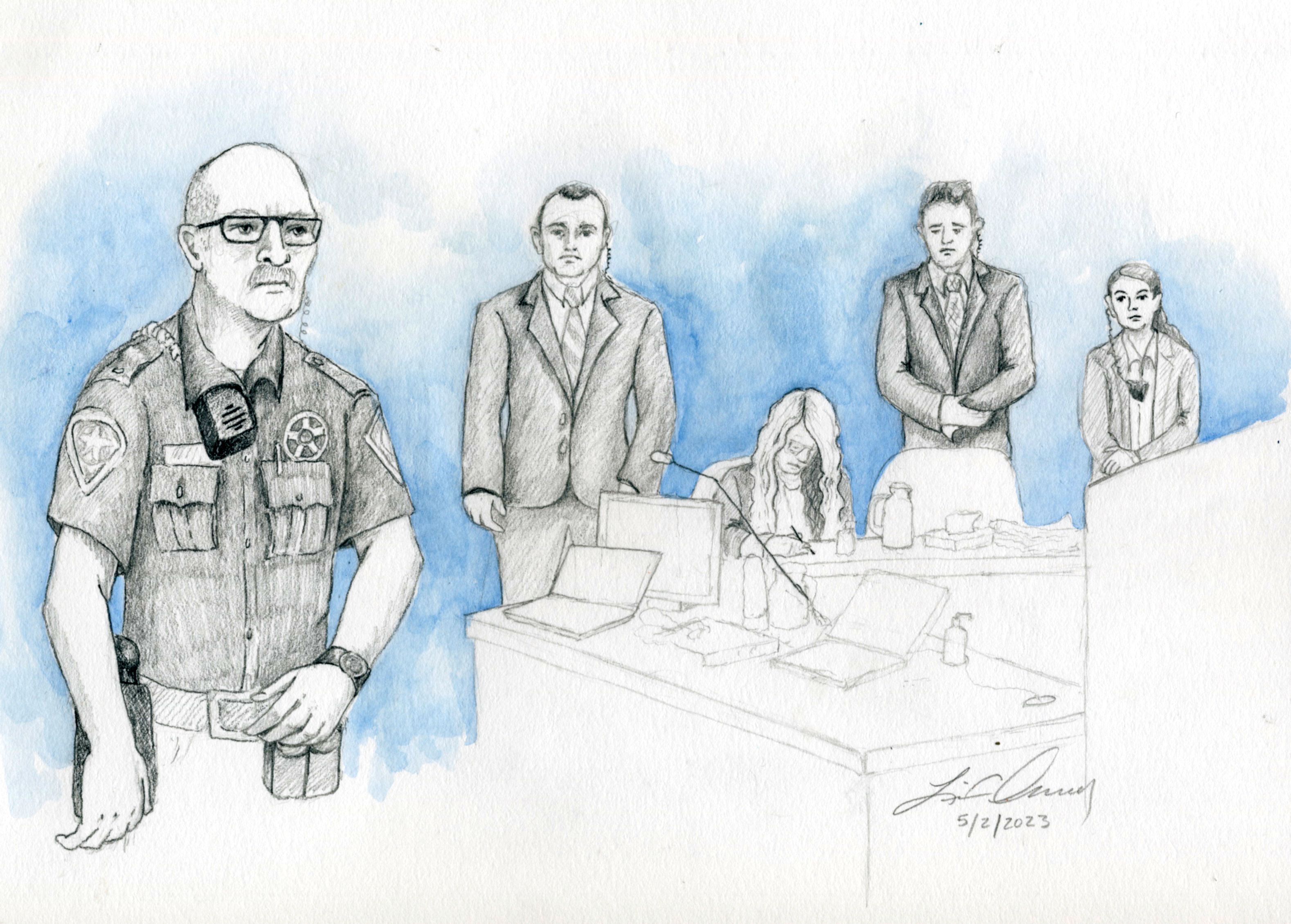 Bailiffs and security stand around Lori Vallow Daybell during her trial in Boise, Idaho on Tuesday.