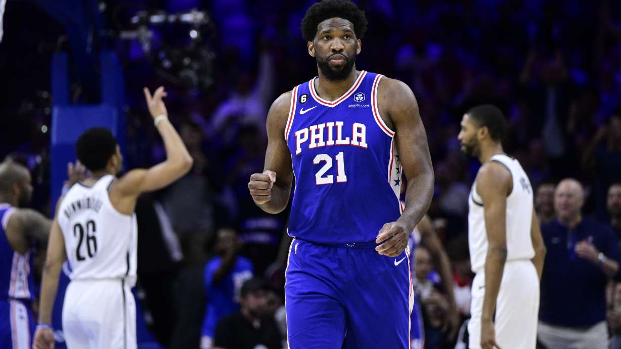 Philadelphia 76ers' Joel Embiid reacts after a score by Tobias Harris in the first half during Game 2 in the first round of the NBA basketball playoffs against the Brooklyn Nets, Monday, April 17, 2023, in Philadelphia.