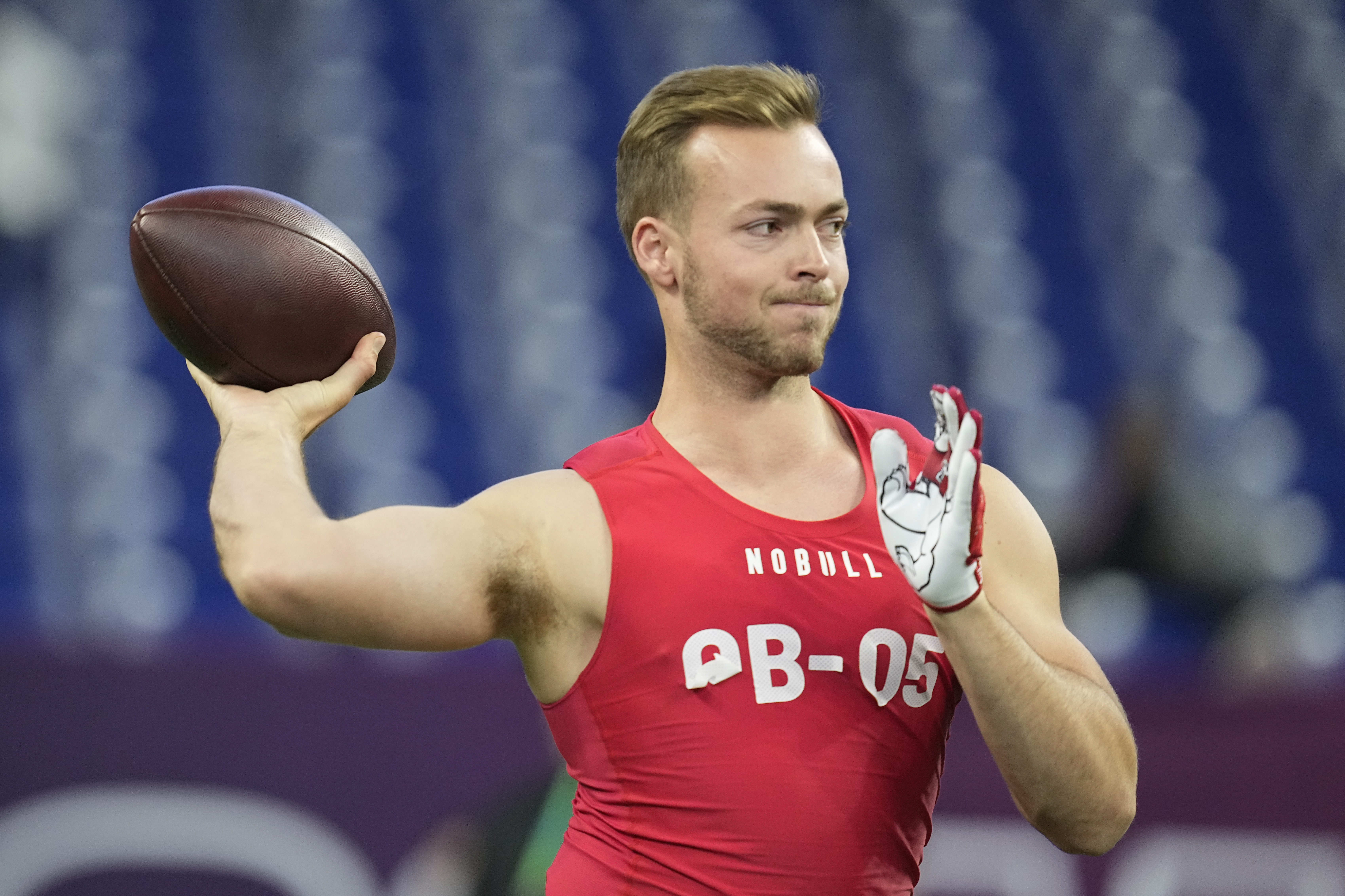 FILE - Fresno State quarterback Jake Haener runs a drill at the NFL football scouting combine in Indianapolis, Saturday, March 4, 2023. Haener bristles when asked about the obvious comparison to fellow experienced but undersized quarterback Brock Purdy. 