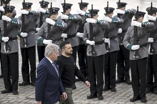 Ukrainian President Volodymyr Zelenskyy, right, and Finnish President Sauli Niinisto, review the honor guard at the Presidential Palace in Helsinki, Finland, Wednesday. Zelenskyy made an unannounced visit to the Finnish capital, Helsinki, for a one-day summit with Nordic leaders, as he pushes Ukraine’s Western allies to provide Kyiv with more military support.