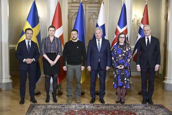 From left, Swedish Prime Minister Ulf Kristersson, Danish Prime Minister Mette Frederiksen, Ukrainian President Volodymyr Zelenskyy, Finnish President Sauli Niinisto, Icelandic Prime Minister Katrin Jakobsdottir and Norwegian Prime Minister Jonas Gahr Store pose for a family photo during the Nordic-Ukrainian Summit in Helsinki, Finland, Wednesday. Zelenskyy is in the Finnish capital, Helsinki, for a one-day Nordic summit.
