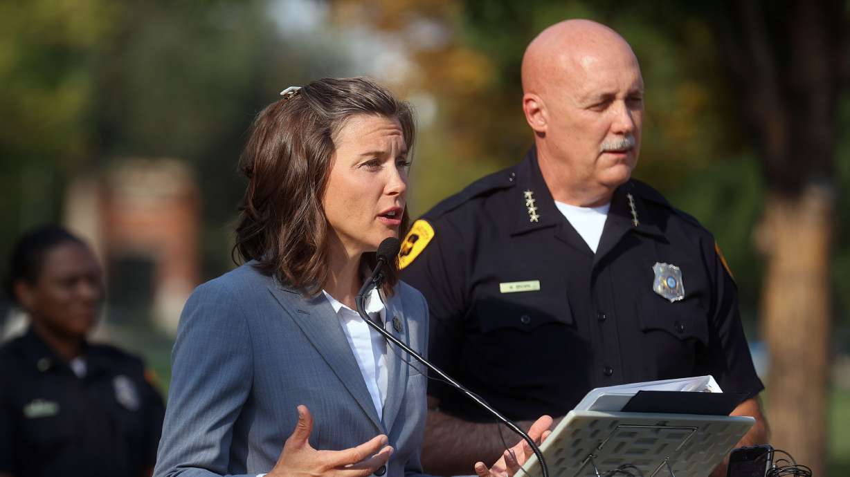 Salt Lake City Mayor Erin Mendenhall, left, talks about the city’s crime rates while standing next to Salt Lake Police Chief Mike Brown at Pioneer Park on Sept. 7, 2021. The city is entering the next phase of its crime reduction plan, they said Wednesday.
