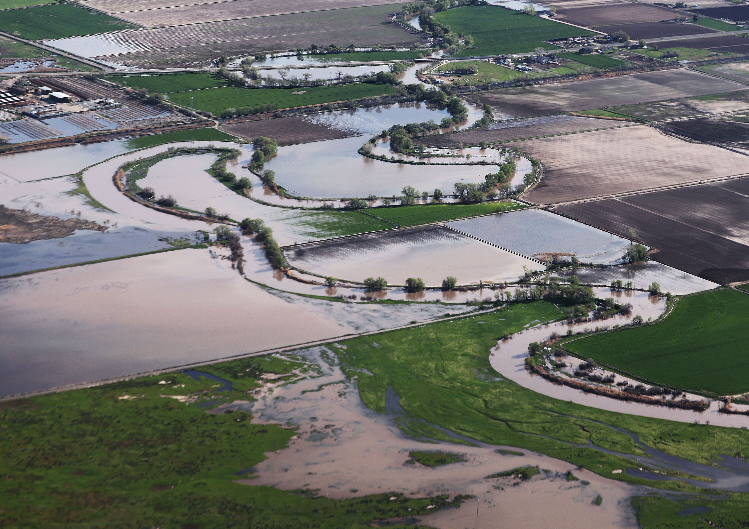 Flooding in Weber County due to snowmelt is photographed from above on Wednesday. Aerial tour by EcoFlight showcases uniqueness of Utah’s saline lake.