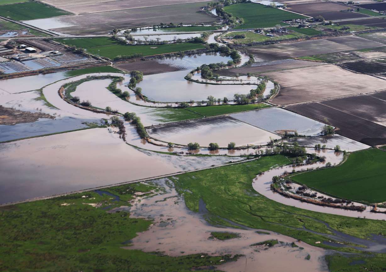 Flooding in Weber County due to snowmelt is photographed from above on Wednesday. Aerial tour by EcoFlight showcases uniqueness of Utah’s saline lake.