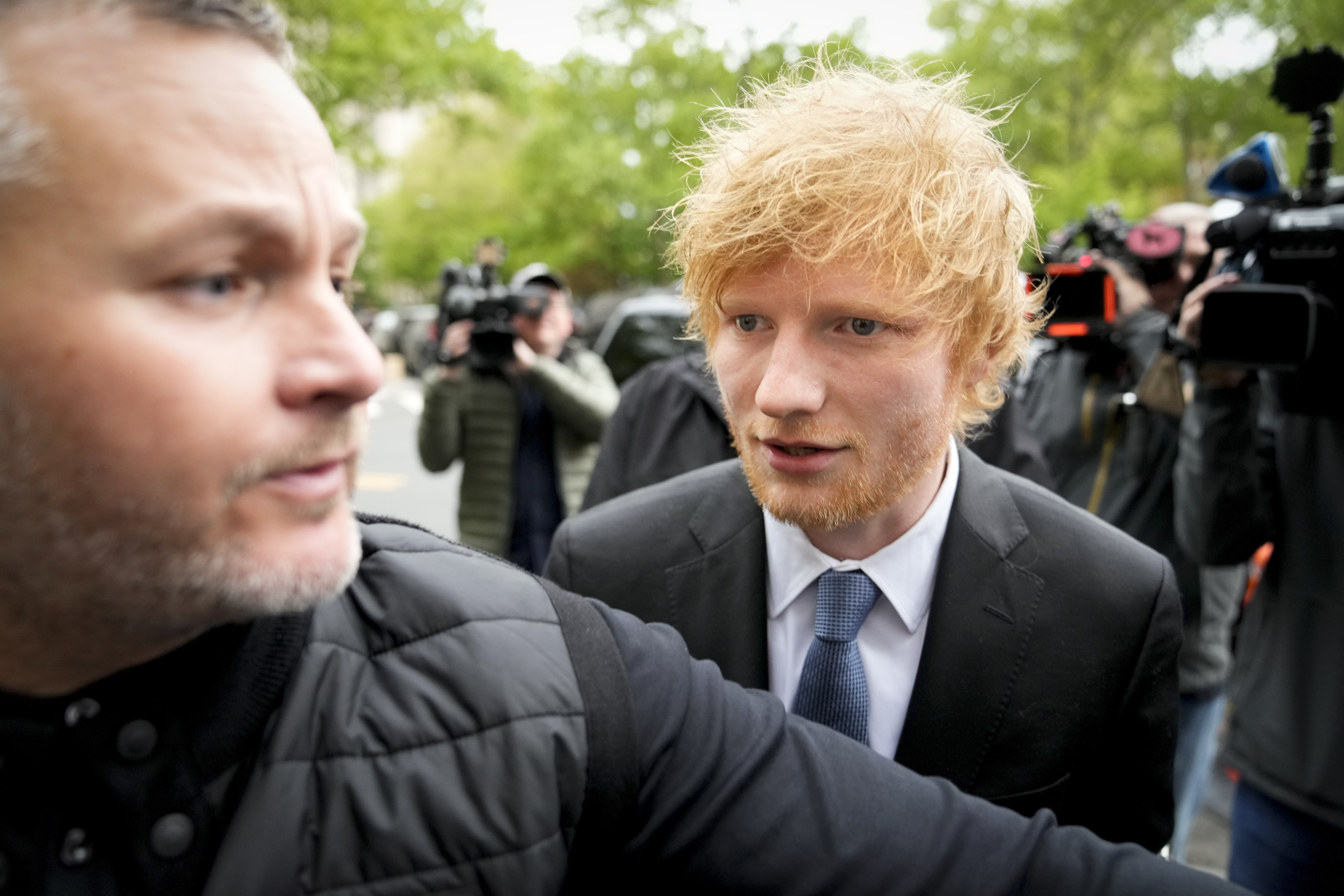 Recording artist Ed Sheeran arrives to New York Federal Court as proceedings continue in his copyright infringement trial, Thursday in New York. 
