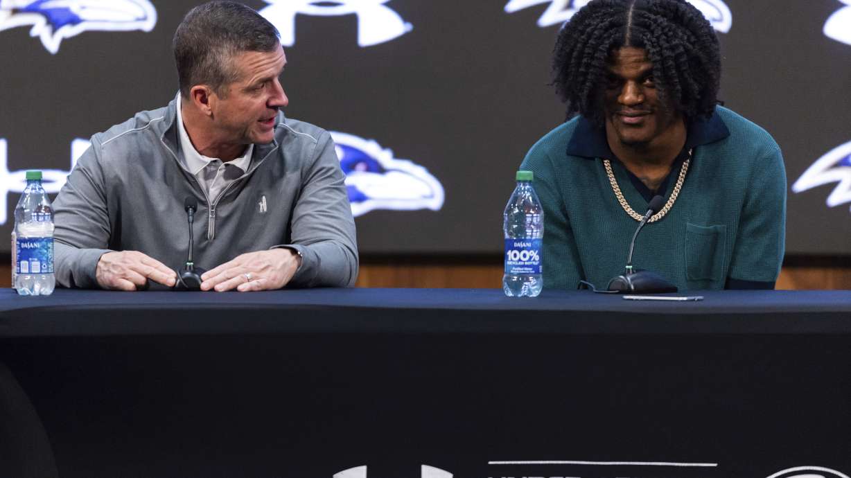 Baltimore Ravens head coach John Harbaugh and quarterback Lamar Jackson speak during a news conference at the NFL football team's training center, Thursday, May 4, 2023, in Owings Mills, Md.
