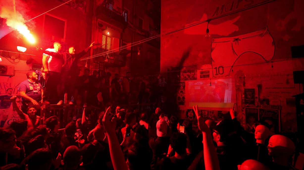 Napoli fans celebrates on the street prior to the start of Udinese Napoli Serie A soccer match, in Naples, Italy, Thursday, May 4, 2023. For the third time in five days, Napoli fans are hoping and preparing to celebrate the Italian league soccer title.