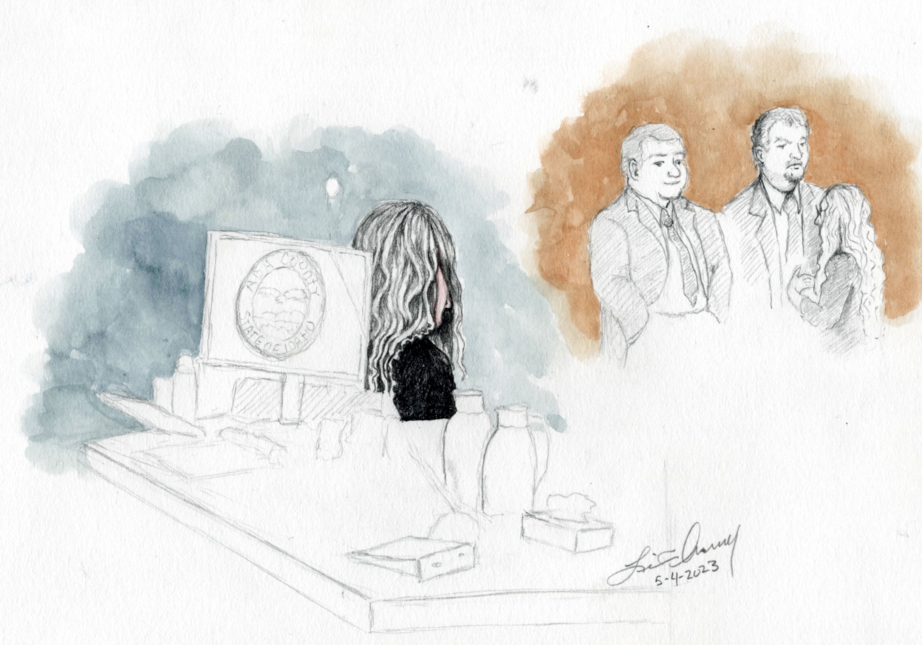 Lori Daybell sits and speaks with her attorneys in sketches of her murder trial on Thursday.