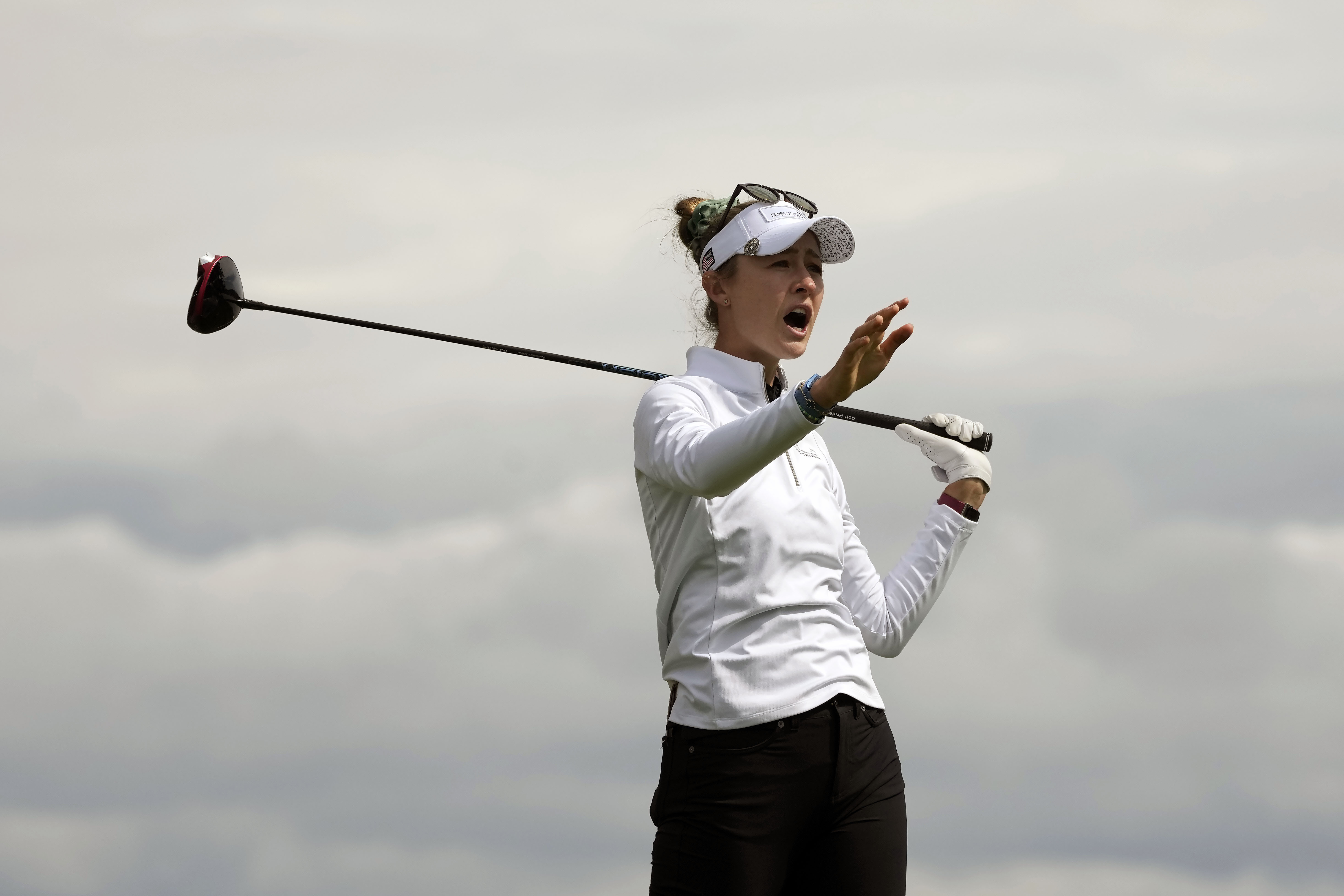Nelly Korda, of the United States, gestures after hitting from the 12th tee at the International Crown match play golf tournament in San Francisco, Thursday, May 4, 2023. 