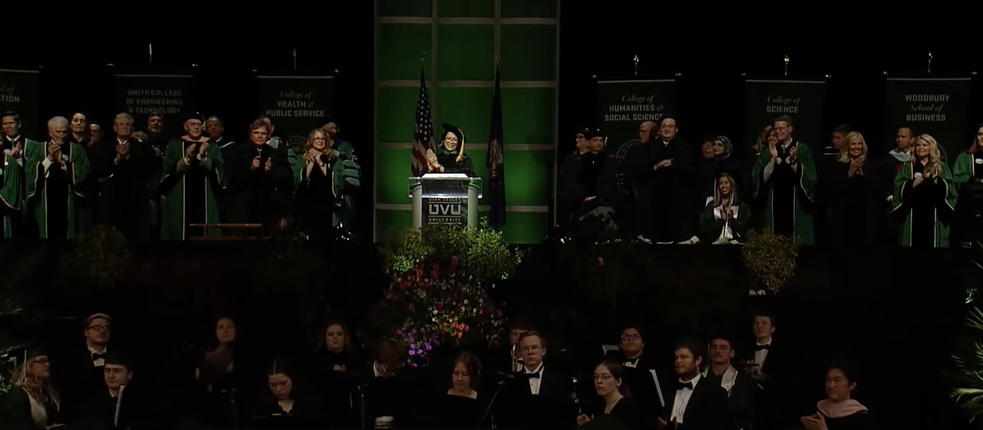 UVU President Astrid S. Tuminez claps for the graduates at the university's 2023 commencement ceremony in Orem on Thursday.