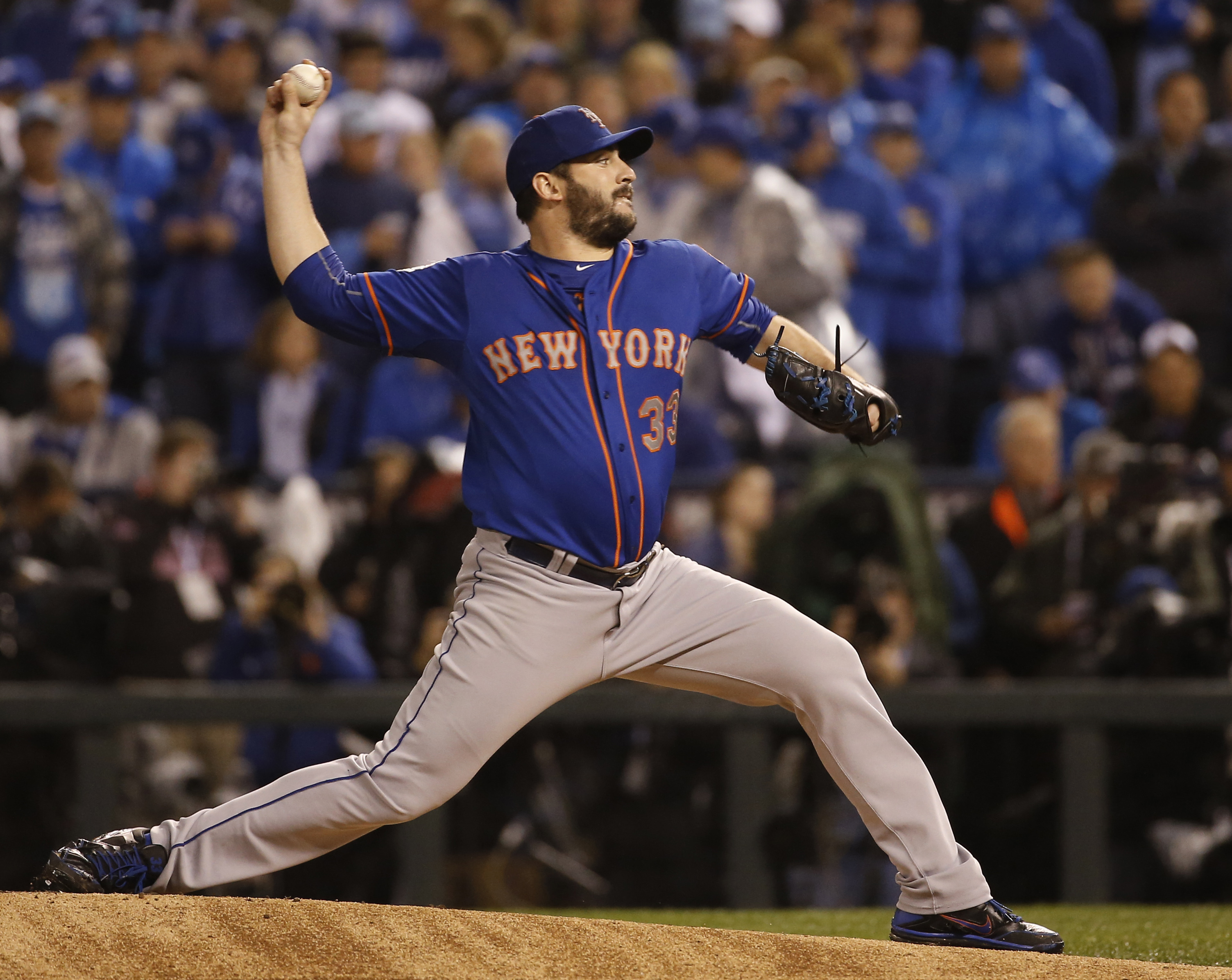 FILE - New York Mets pitcher Matt Harvey throws during the first inning of Game 1 of the Major League Baseball World Series against the Kansas City Royals, Tuesday, Oct. 27, 2015, in Kansas City, Mo. Matt Harvey announced Frida, May 5, 2023, he's retiring from baseball after a nine-year pitching career highlighted by his time as the Mets' “Dark Knight” ace.
