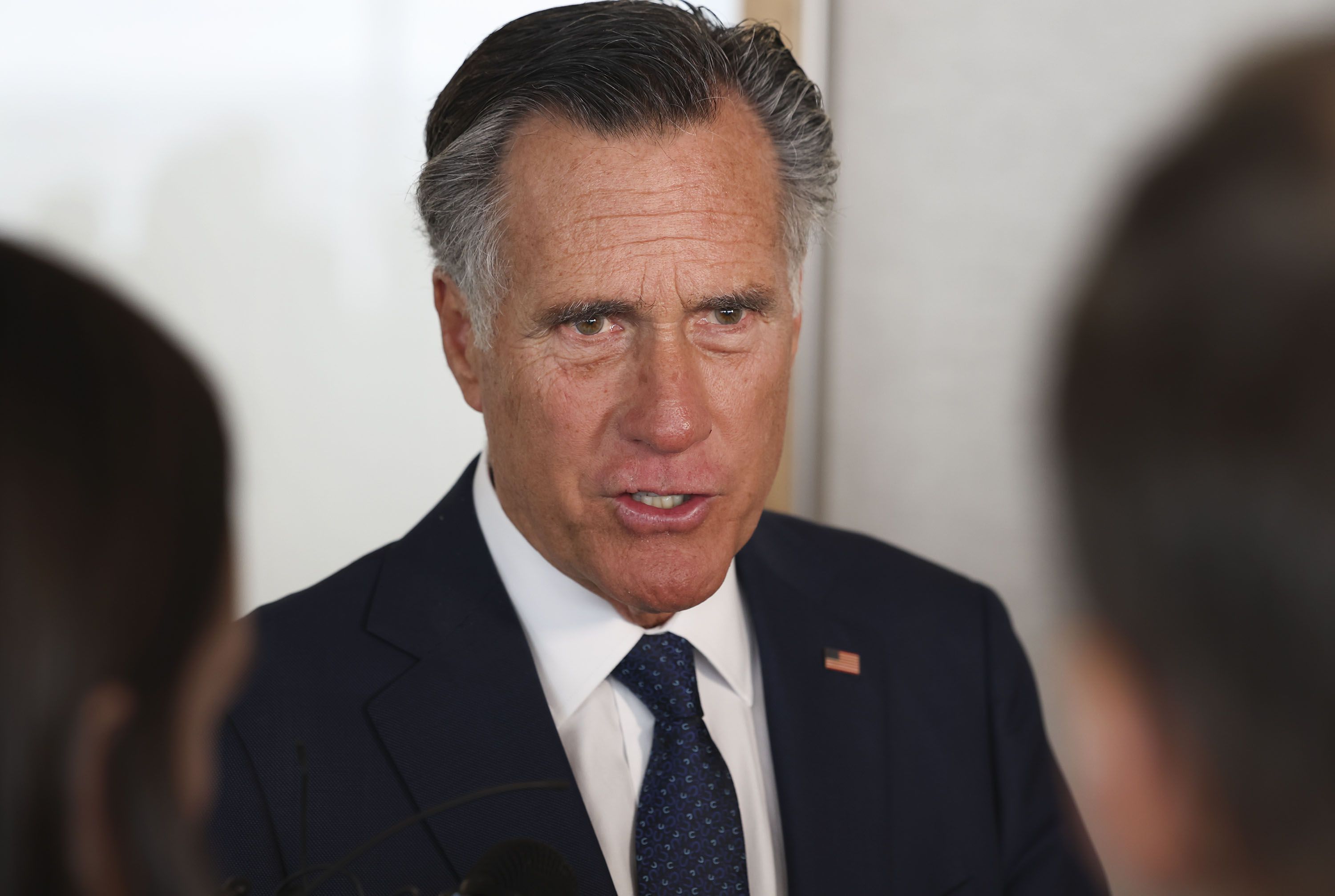 Sen. Mitt Romney following an event with the Utah Aerospace and Defense Association at the Larry H. Miller Company in Sandy on Feb. 23. Romney urged the Senate to put "posturing and politicizing" aside to address the country's fiscal problems. 
