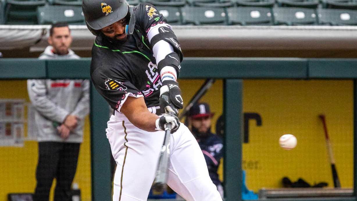 Salt Lake Bees outfielder Jo Adell swings at a pitch during a game against the Reno Aces at Smith's Ballpark on April 22.