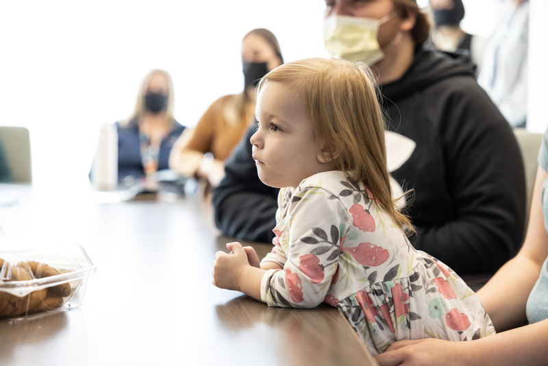 Eva, 2, sits on her mom's lap as she meets Kate, the woman who donated part of her liver to Eva and saved her life.
