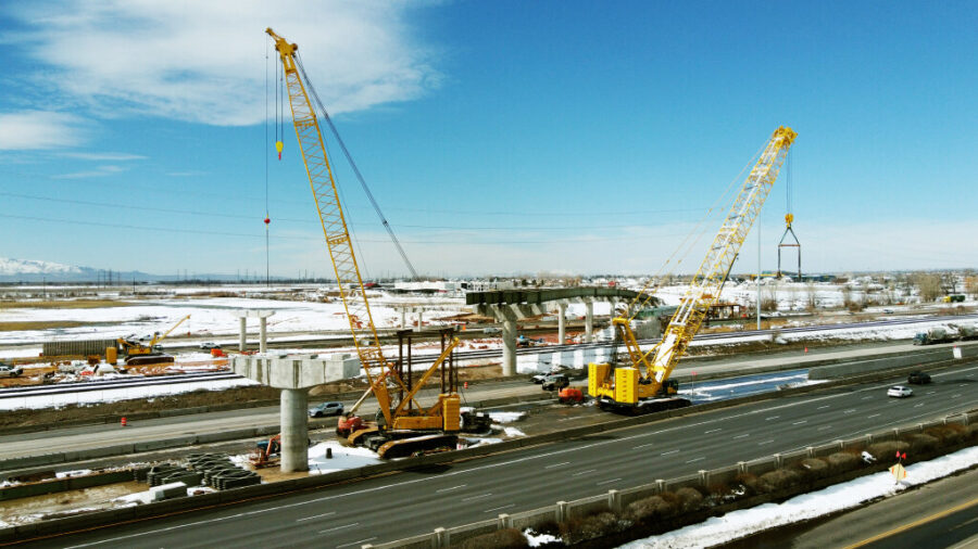 Workers construct a bridge over I-15 on the West Davis Corridor near Farmington on March 28. The northbound side of Legacy will close Friday at 10 p.m. until Monday at 5 a.m. while UDOT places bridge beams that’ll connect the West Davis Highway to southbound I-15.
