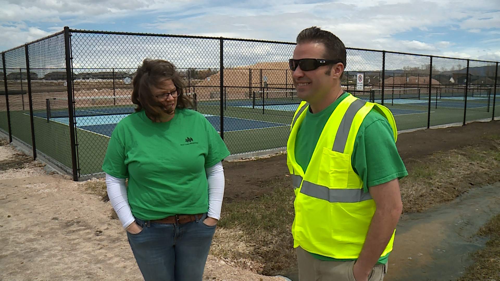 Samantha Coontz, a volunteer, and Joey Stocking, the Garden City liaison for Bear Lake, are keeping an eye on rising floodwaters.
