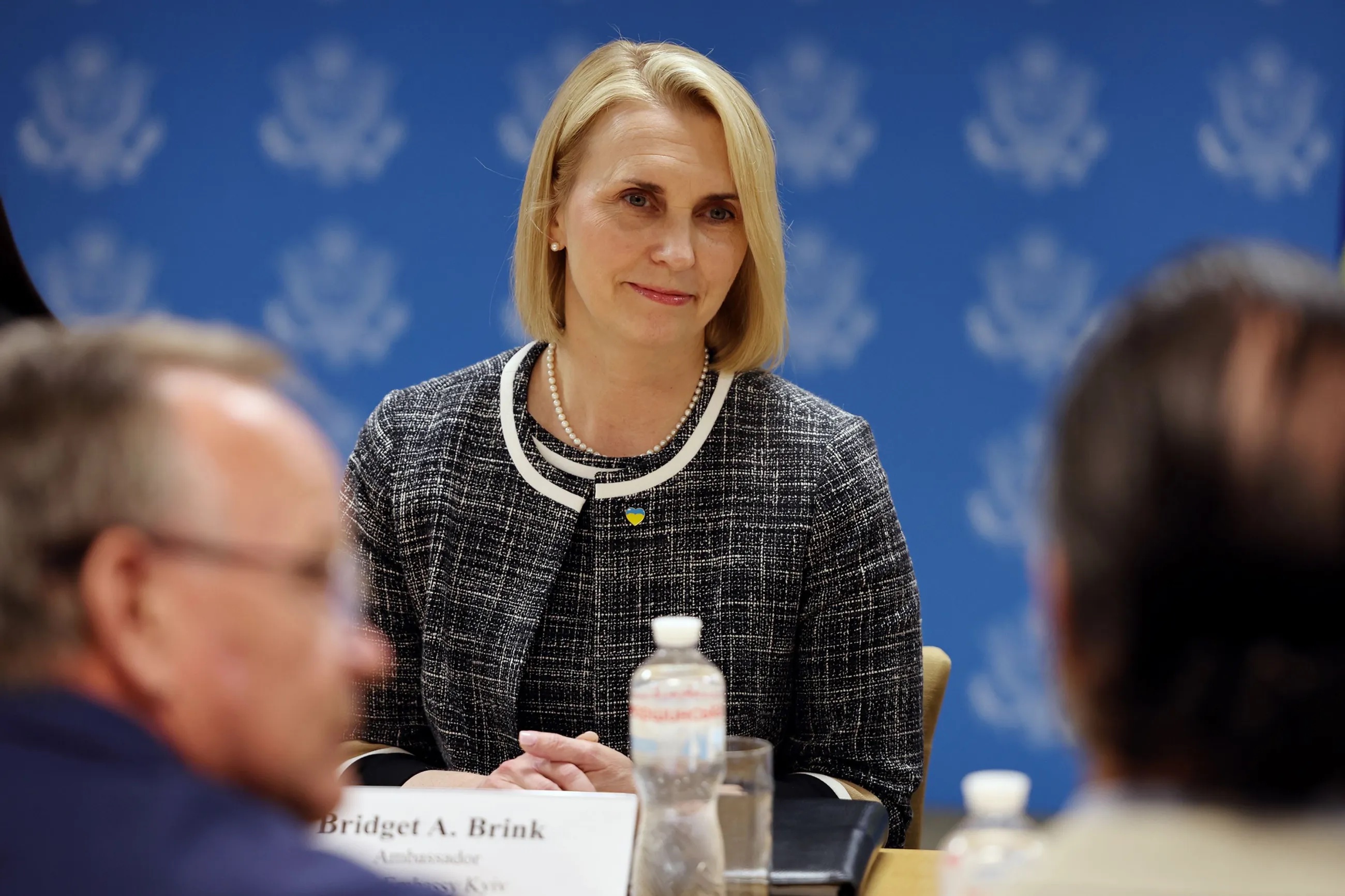 U.S. Ambassador to Ukraine Bridget A. Brink listens as she leads a discussion with Utah’s trade delegation. State Senate President Stuart Adams, left, headed the team here at the U.S. Embassy in Kyiv, Ukraine, on May 2.