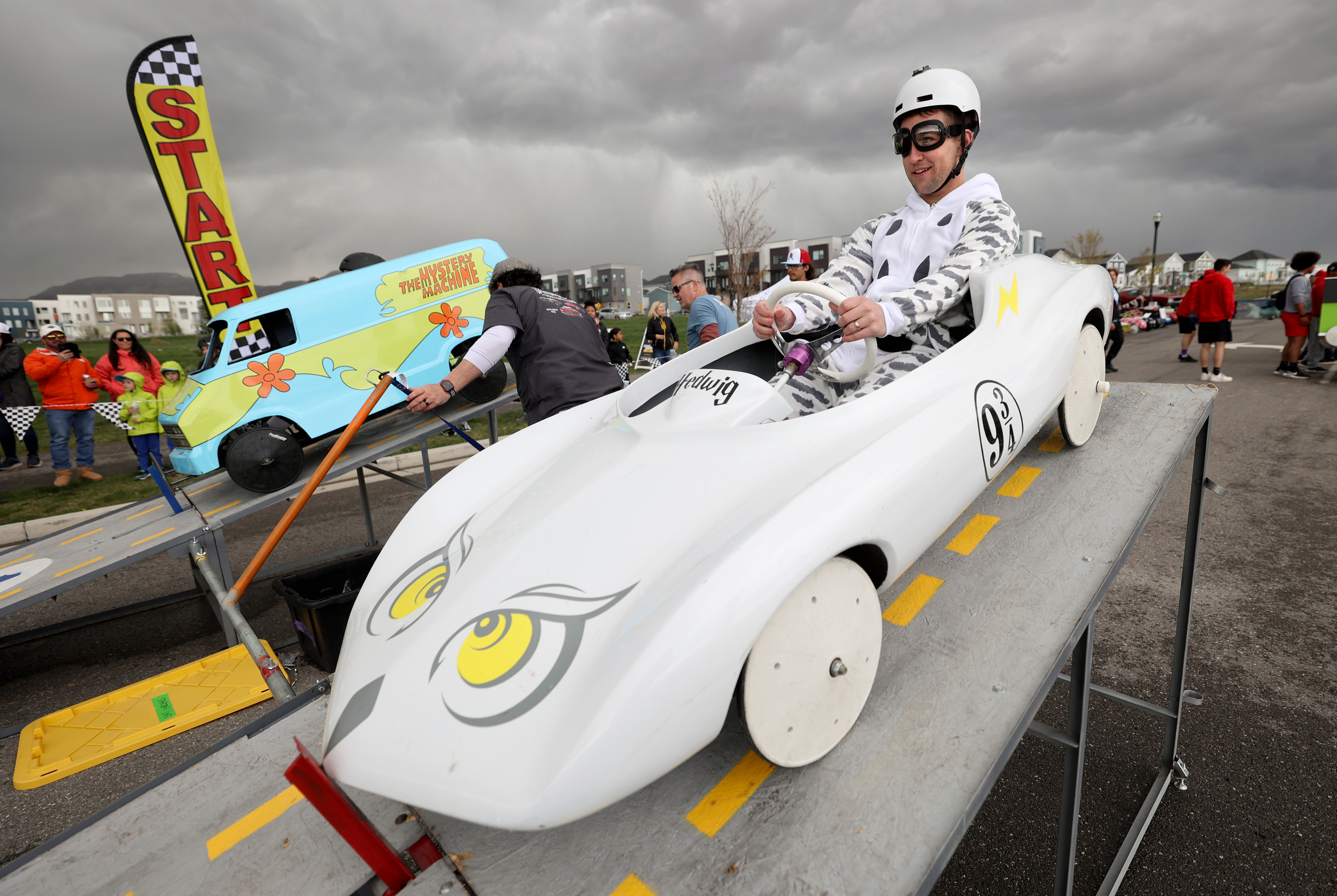 Jeff Nigbur waits for the starter to drop the starting gate during the 3rd Annual LiveDaybreak Soap Box Derby in South Jordan on Saturday.