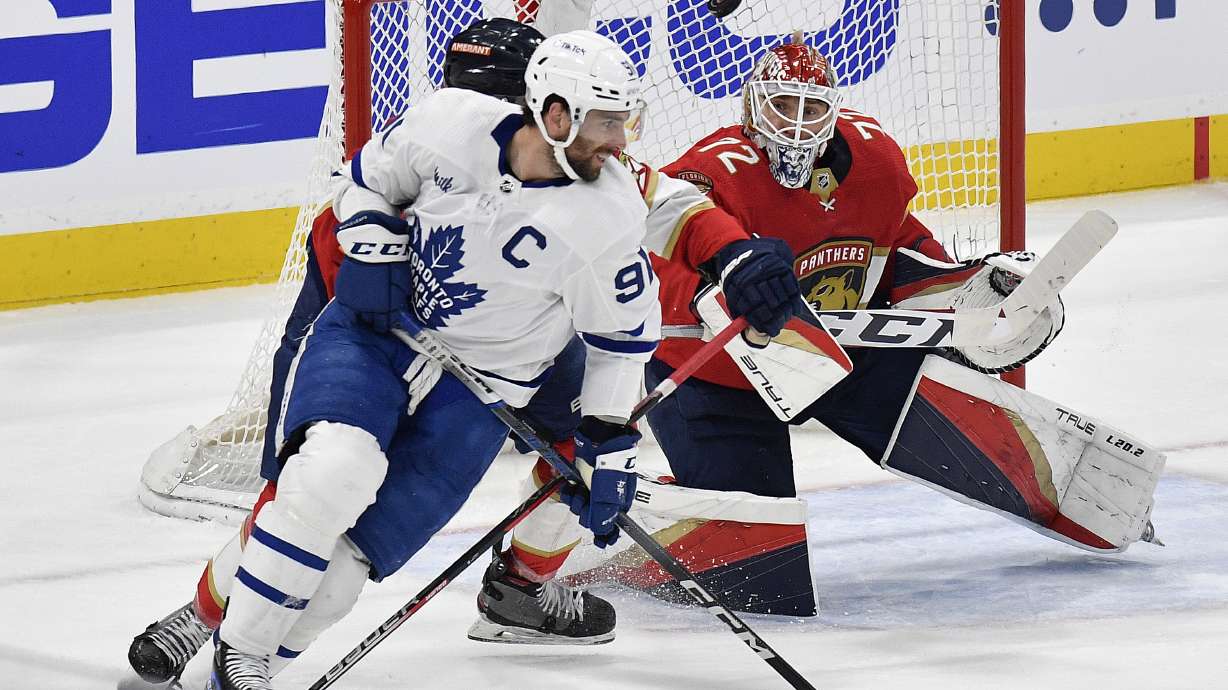 Florida Panthers goaltender Sergei Bobrovsky (72) stops the puck in front of Toronto Maple Leafs center John Tavares (91) during the second period of Game 3 of an NHL hockey Stanley Cup second-round playoff series, Sunday, May 7, 2023, in Sunrise, Fla.