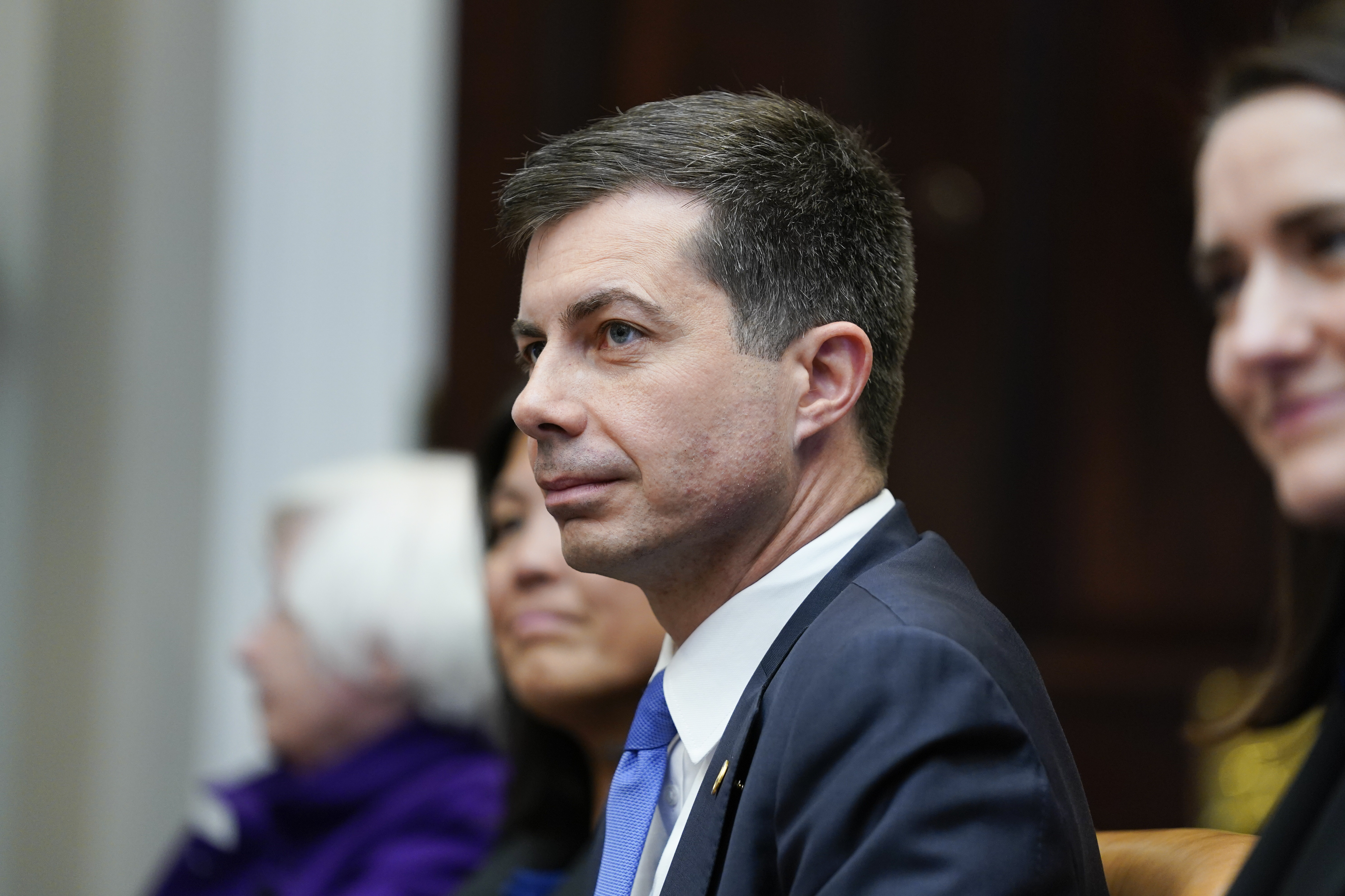 Transportation Secretary Pete Buttigieg attends a meeting with President Joe Biden's "Investing in America Cabinet," in the Roosevelt Room of the White House, Friday in Washington. 