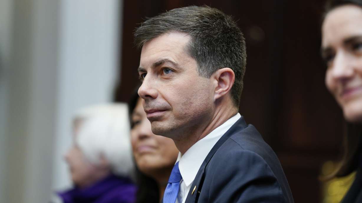 Transportation Secretary Pete Buttigieg attends a meeting with President Joe Biden's "Investing in America Cabinet," in the Roosevelt Room of the White House, Friday in Washington.