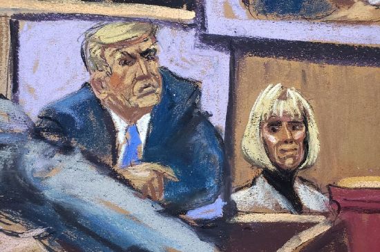 Former Elle magazine advice columnist E. Jean Carroll watches as Joe Tacopina, lawyer of former U.S. President Donald Trump, makes closing arguments during a civil trial where Carroll accuses Trump of raping her in a department store dressing room in the mid-1990s, and of defamation, in New York, Monday in this courtroom sketch.