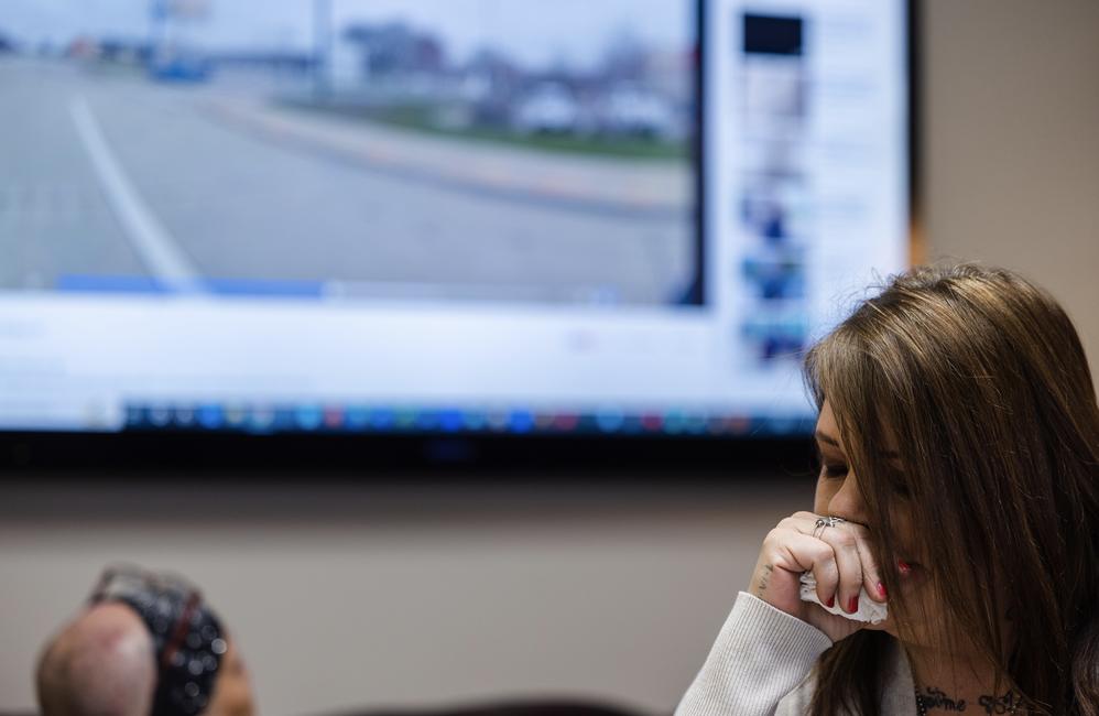 Marsha Quintana wipes away tears as a body camera video showing her son being tackled and punched by Ogden police officers is played. Quintana and her son, Shawn Sims, along with their attorney Robert Sykes held a press conference on Monday to announce the filing of a federal civil lawsuit against the police department and the city of Ogden.