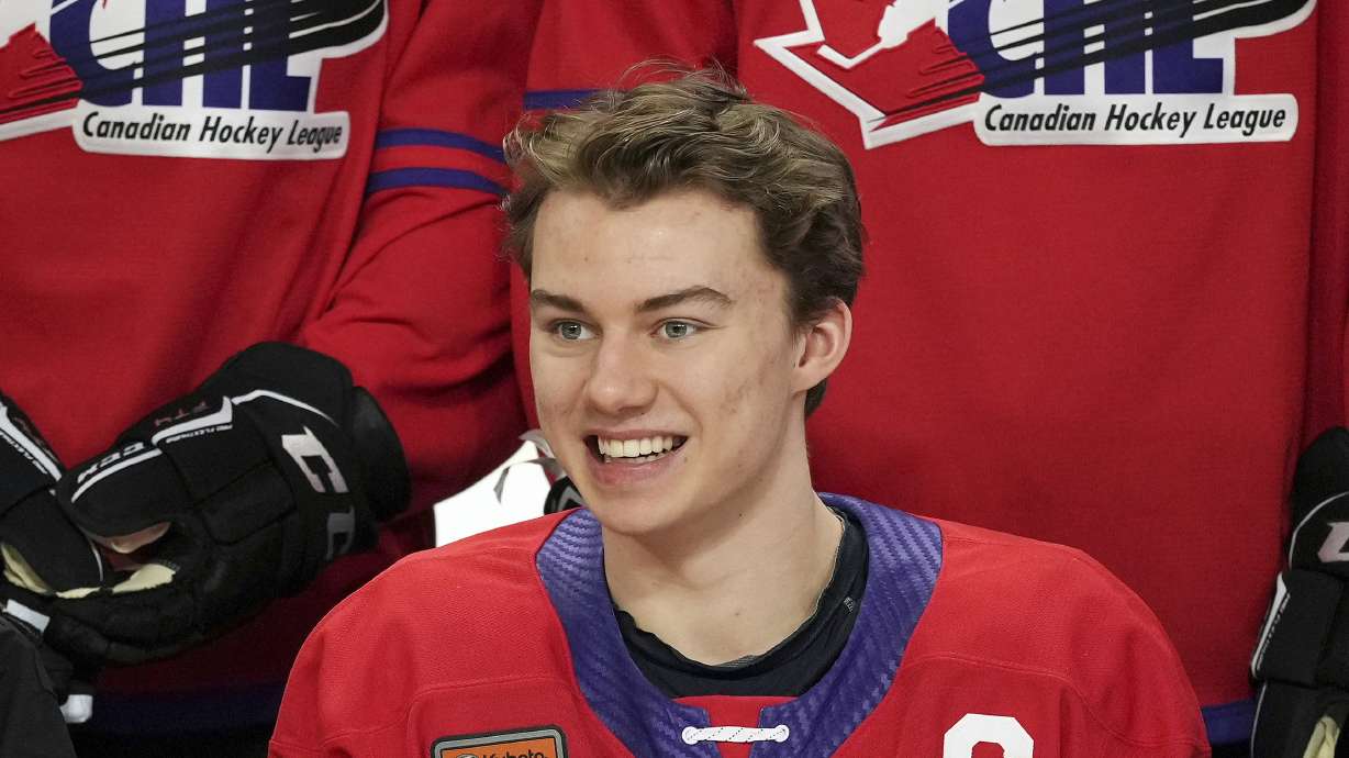 FILE - Regina Pats' Connor Bedard smiles for a team photo ahead of the CHL/NHL Top Prospects game, in Langley, British Columbia, Wednesday, Jan. 25, 2023. The NHL draft lottery is drawn, determining which team gets the chance to select Connor Bedard with the No. 1 pick. The Anaheim Ducks, Columbus Blue Jackets and Chicago Blackhawks have the highest odds of landing the most anticipated top pick since Connor McDavid in 2015.