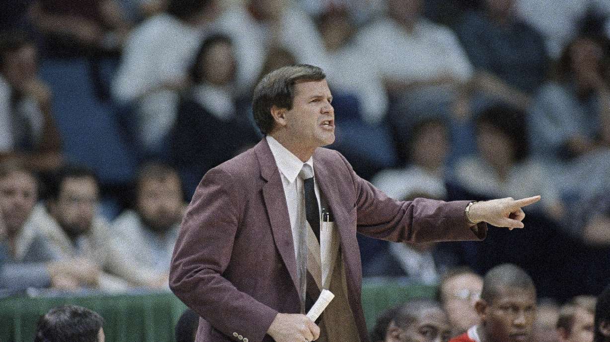FILE - Louisville coach Denny Crum yells from the sideline during the first half of an NCAA college basketball semifinal game against LSU at Reunion Arena, Saturday, March 29, 1986, Dallas, Texas. Denny Crum, who won two NCAA men’s basketball championships and built Louisville into one of the 1980s’ dominant programs during a Hall of Fame coaching career, died Tuesday, May 9, 2023. He was 86.