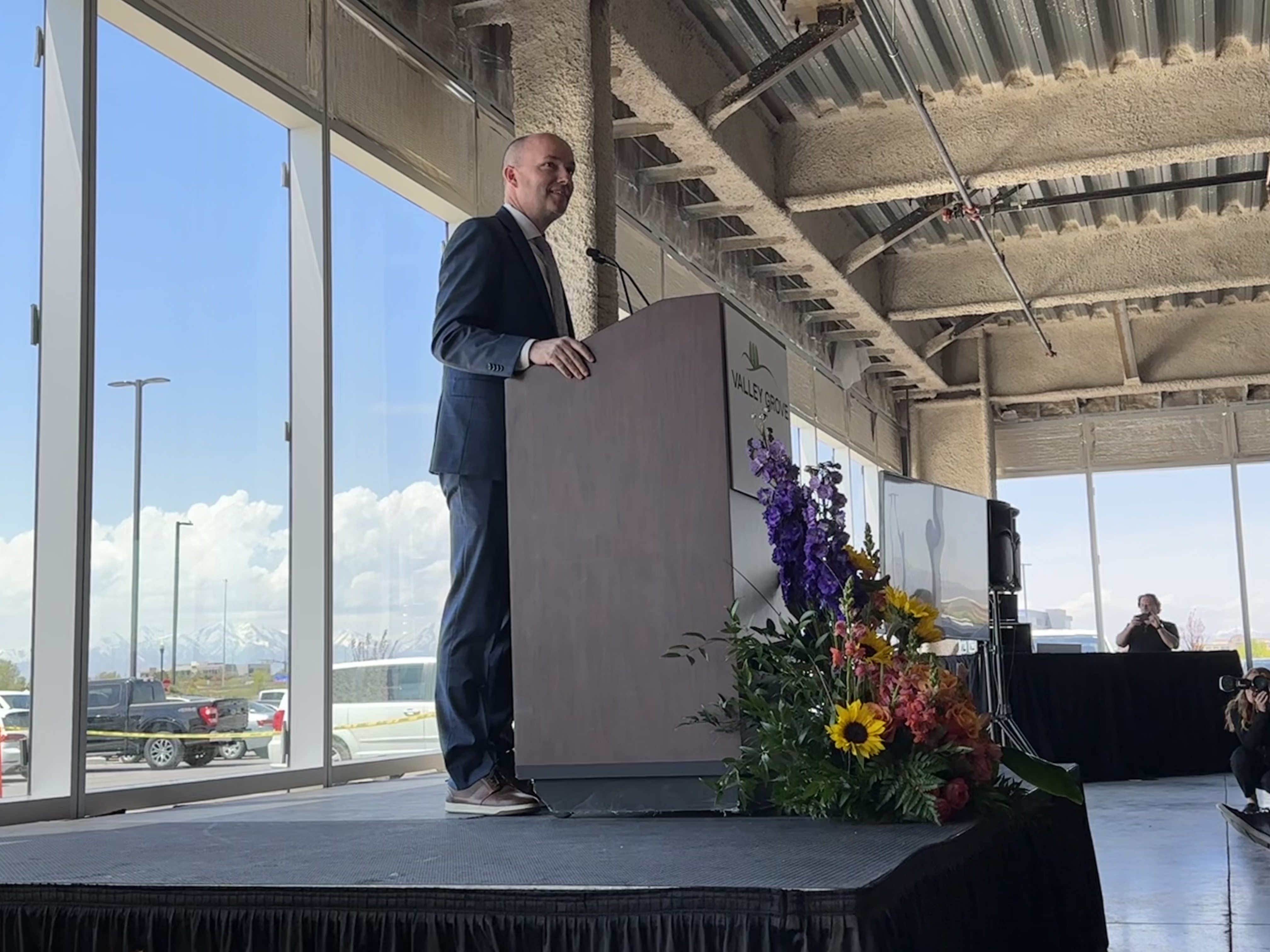 Gov. Spencer Cox speaks at a groundbreaking ceremony for St. John Properties' development project called Valley Grove in Pleasant Grove on Tuesday.