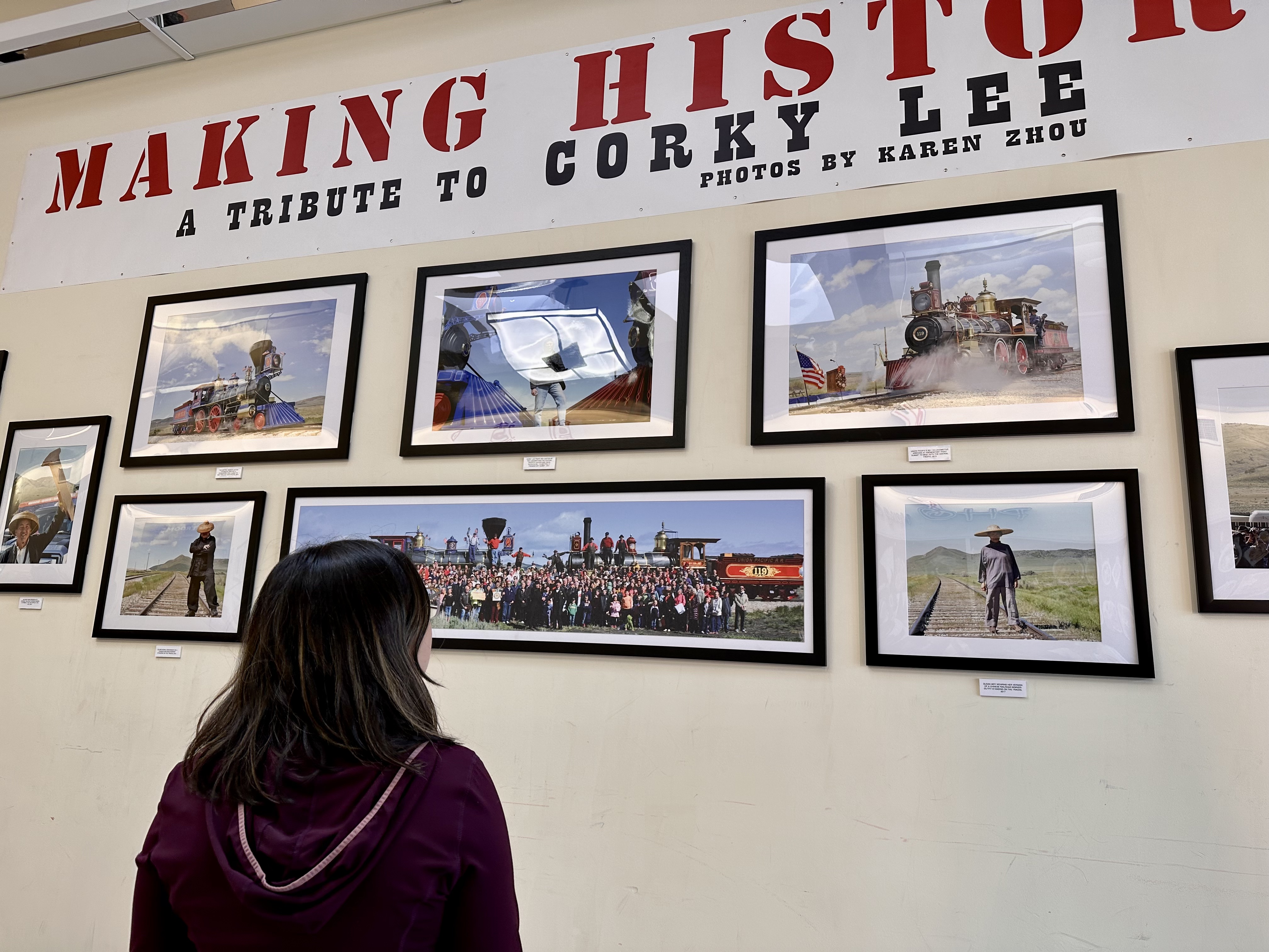 Samantha Tse looks at the "Making History" exhibit in the Chinatown Supermarket in South Salt Lake on Tuesday.
