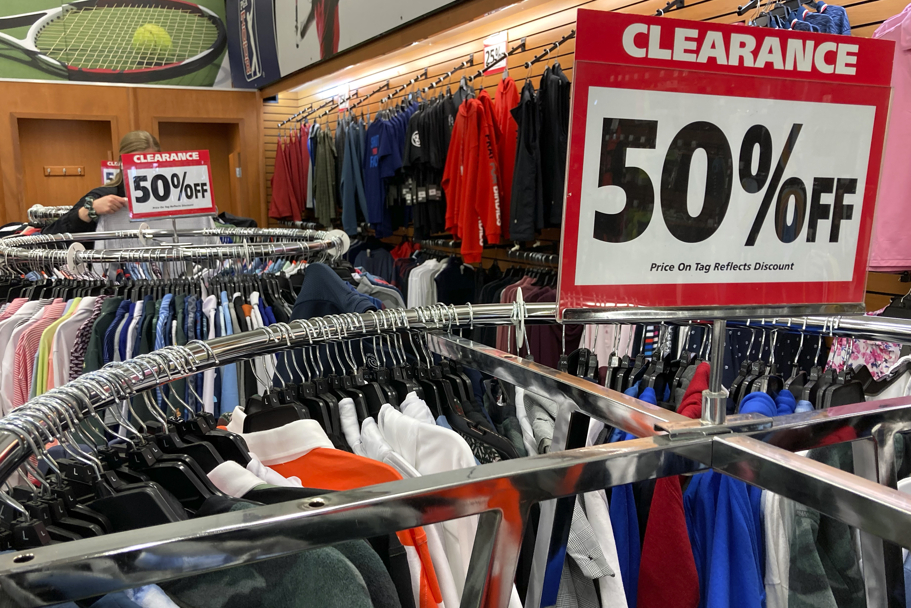 Clearance sale signs are displayed at a retail store in Downers Grove, Ill., April 26. On Wednesday, the Labor Department reports on U.S. consumer prices for April. 
