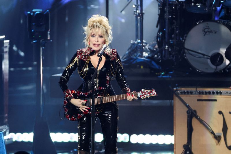 Dolly Parton performs in Los Angeles, Nov. 6, 2022. Parton has teamed up with top performers for her upcoming record "Rockstar," her first rock album.