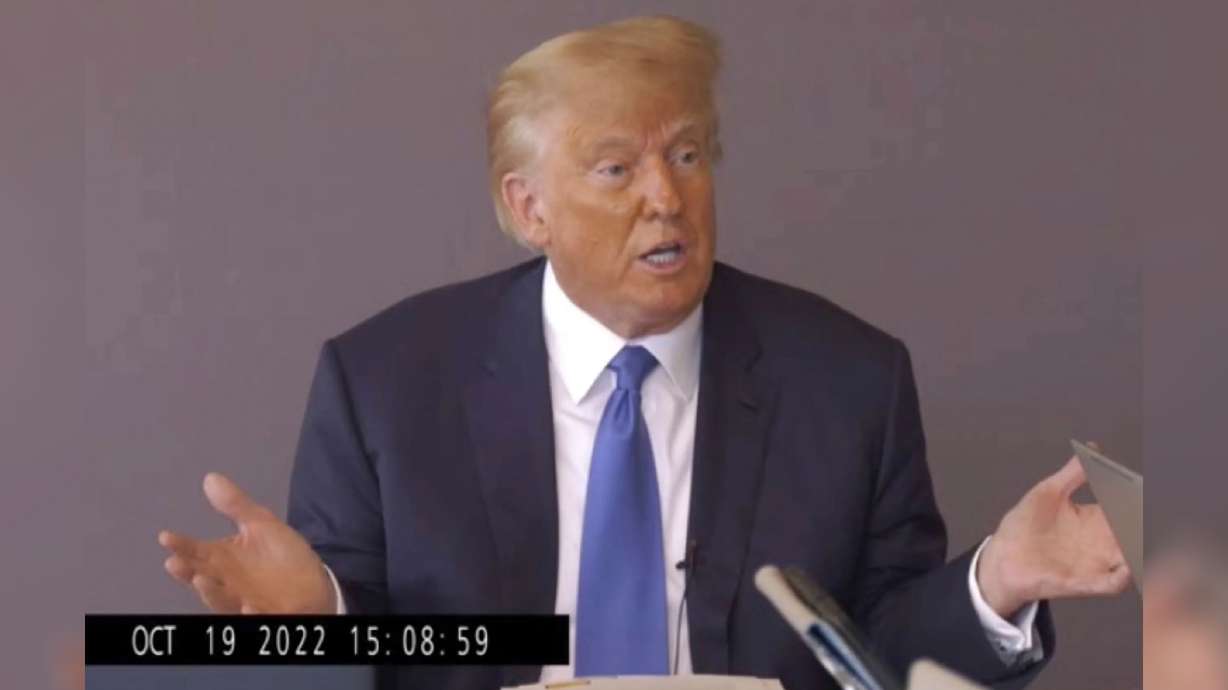 Former President Donald Trump answers questions during his Oct. 19, 2022, deposition for his trial against writer E. Jean Carroll. Sen. Mitt Romney says Trump is not fit to be president.