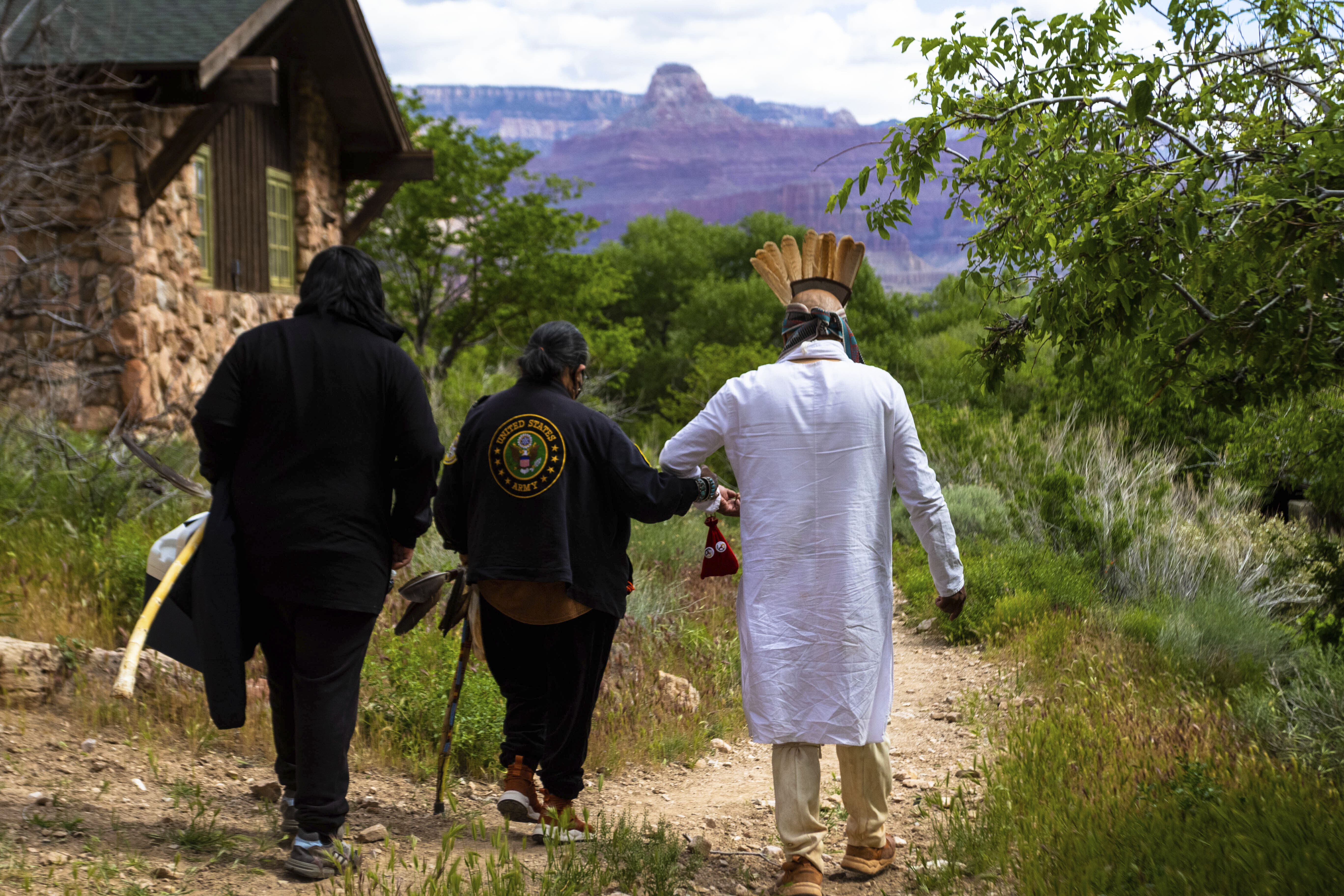 Members of the Havasupai Tribe walk down to a popular campground at Grand Canyon National Park on May 5. The tribe held a blessing ceremony to mark the renaming of the campground from Indian Garden to Havasupai Gardens.
