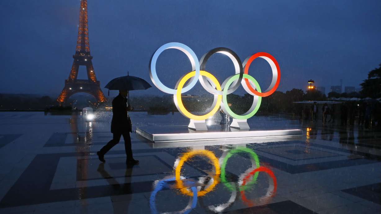 FILE - A display of the Olympic rings is set up on Trocadero plaza that overlooks the Eiffel Tower, after the vote awarding the 2024 Games to the French capital, in Paris, Wednesday, Sept. 13, 2017. Online applications for a lottery draw where winners can buy tickets for next year’s Olympic Games in Paris has closed. Entries for the draw ended at 6 p.m. local time on Thursday, April 20, 2023 and applicants must wait until early next month to find out if they were successful.