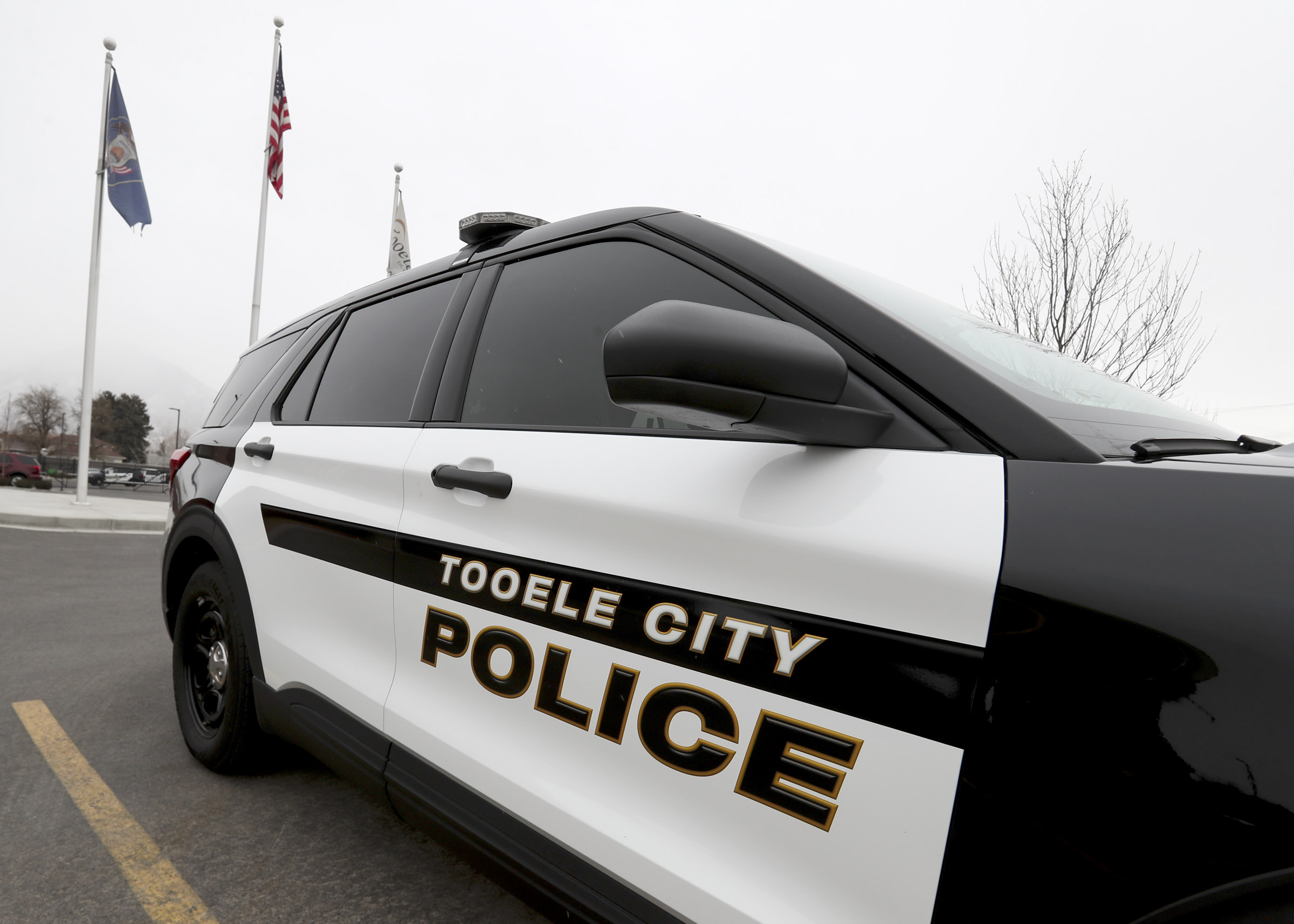 Two men on a motorcycle ran a red light at 1000 N. Main in Tooele and hit the side of a car early Monday. Police said Tuesday that one of the men has died.