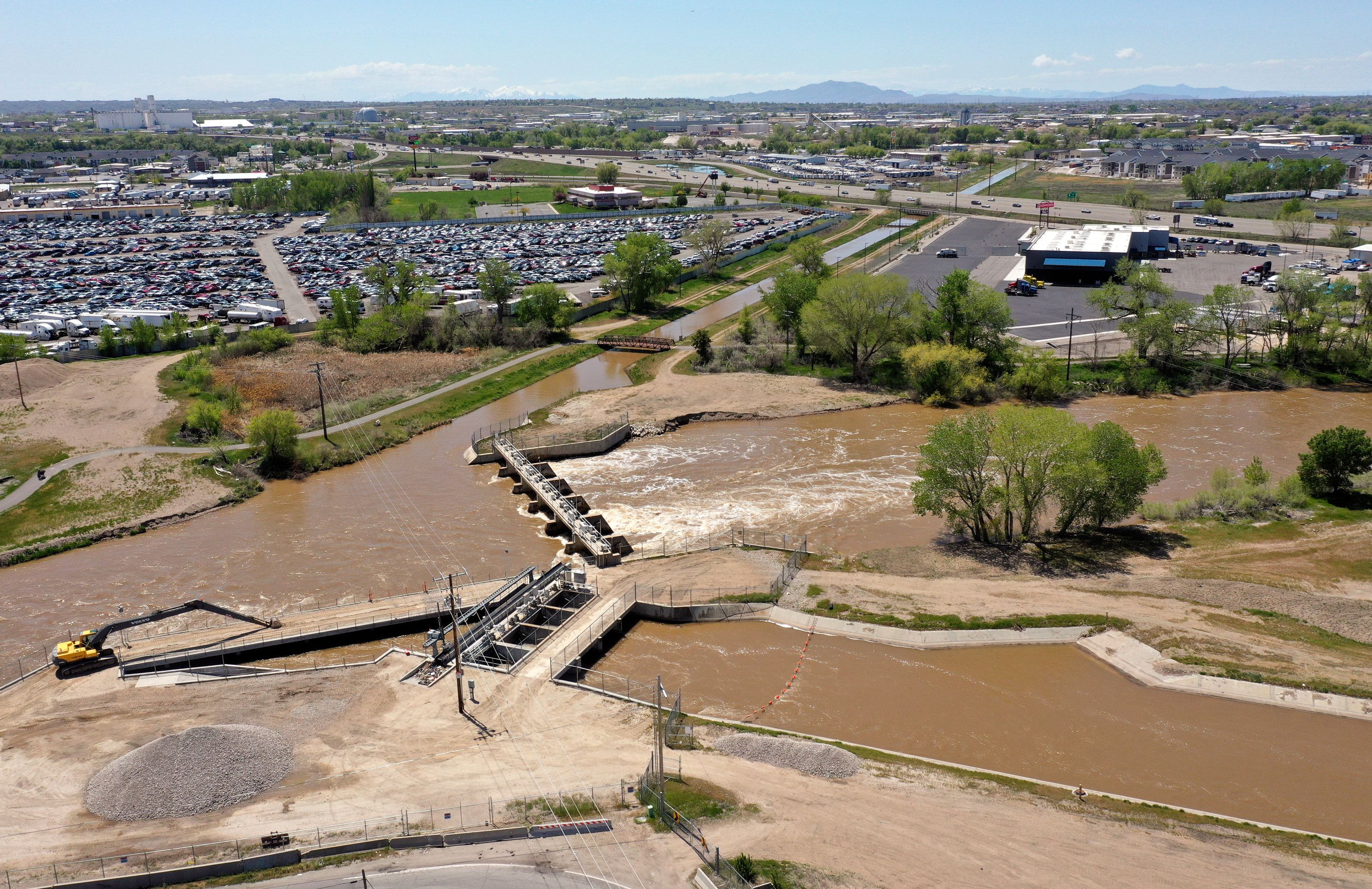 The Slaterville Diversion Dam is pictured in Marriott-Slaterville, Weber County, on Thursday. Weber Basin Water Conservancy District officials say that currently around 65 million gallons of water are diverted daily to farmlands in West Haven, Roy and Layton via the channel on the left.