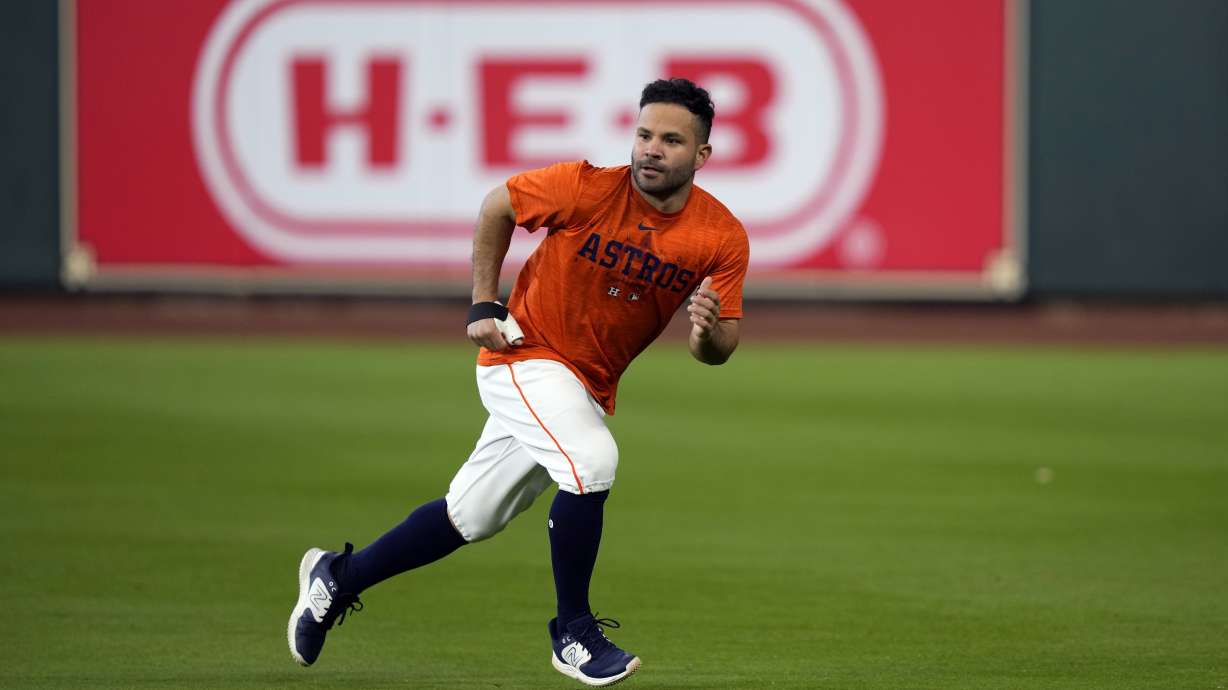 Houston Astros' Jose Altuve runs in the outfield before a baseball game against the Texas Rangers Sunday, April 16, 2023, in Houston.
